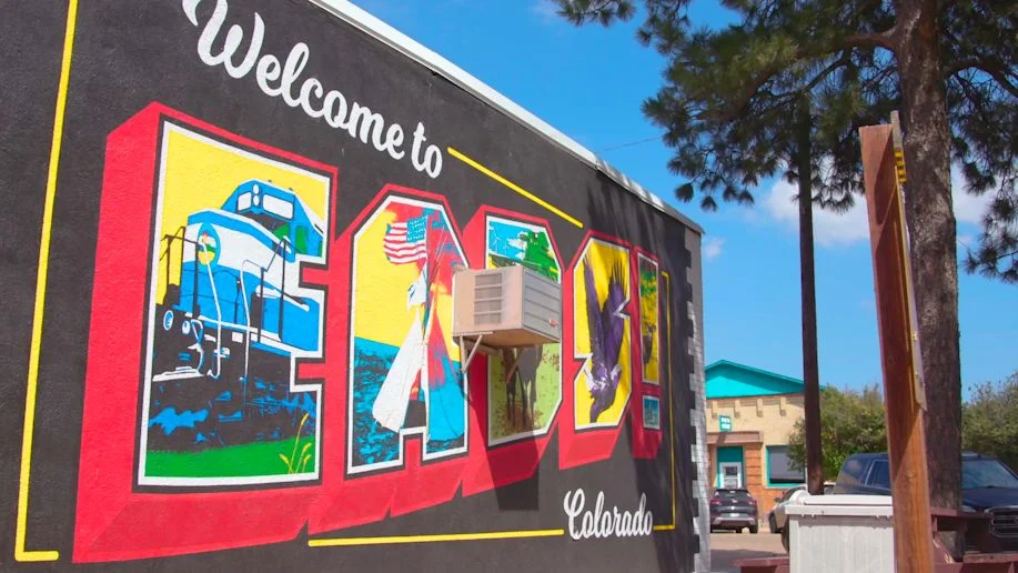 Barnett commissioned a special Eads mural for the side of the Kiowa County Independent building, which was then painted by the paper’s graphic designer. Photo: Chase McCleary, Rocky Mountain PBS