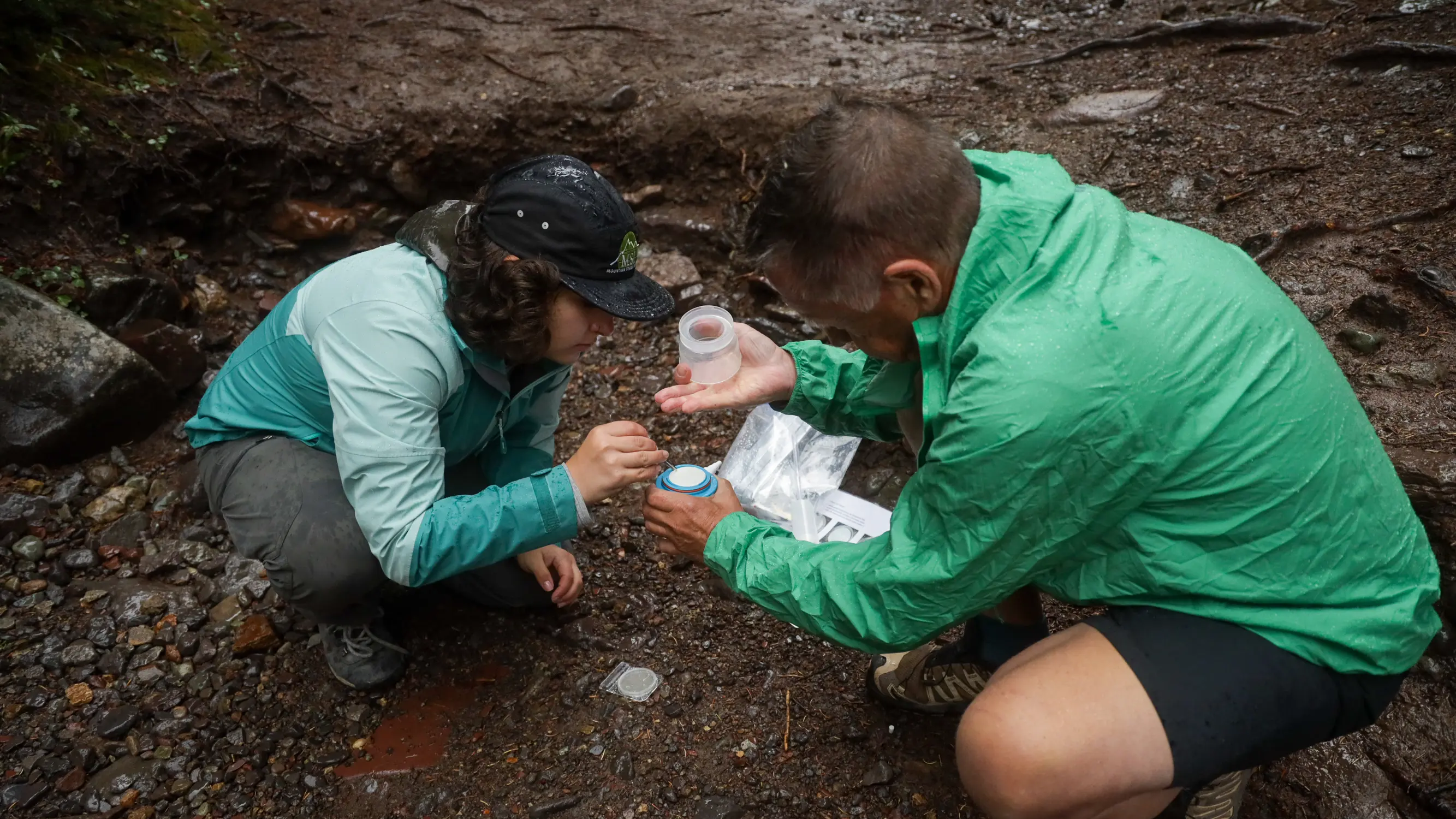 Perez and Brown collect samples. Photo: Ziyi Xu, Rocky Mountain PBS