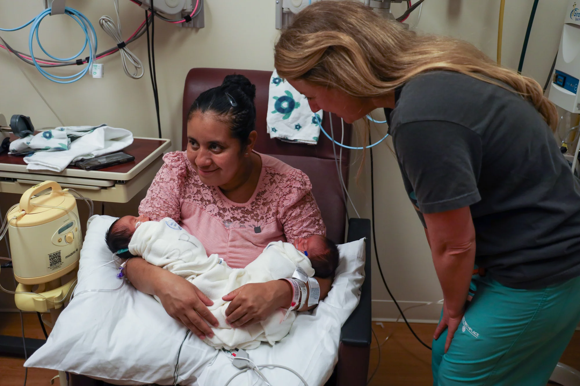 New mom Jubelki Rivera Gonzales holds her twins in Valley View Hospital’s NICU (or neonatal intensive care unit.) Gonzales moved to Colorado about five years ago from Nicaragua. Photo: Carly Rose, Rocky Mountain PBS.