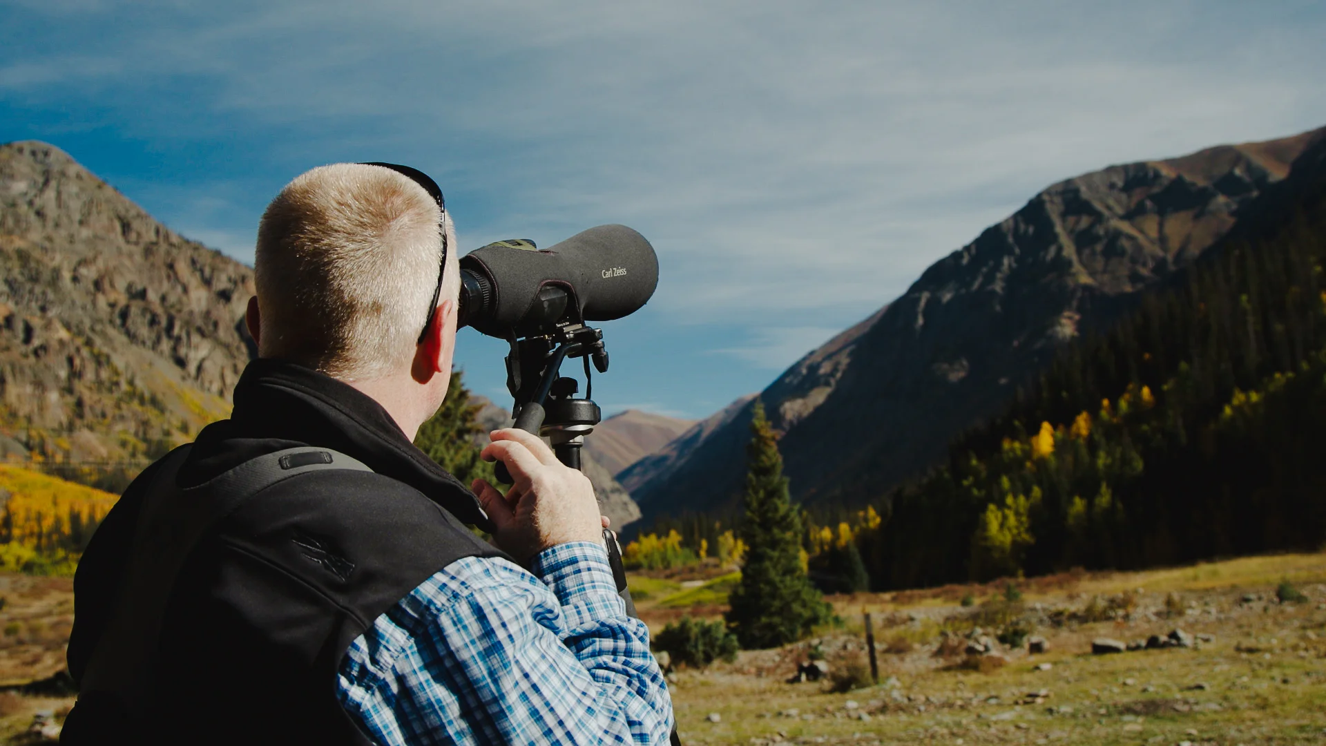 Meyers searches for bighorn sheep outside of Silverton, Colorado. The area has become ground zero for conflict between domestic and bighorn sheep. Photo: Ziyi Xu, Rocky Mountain PBS