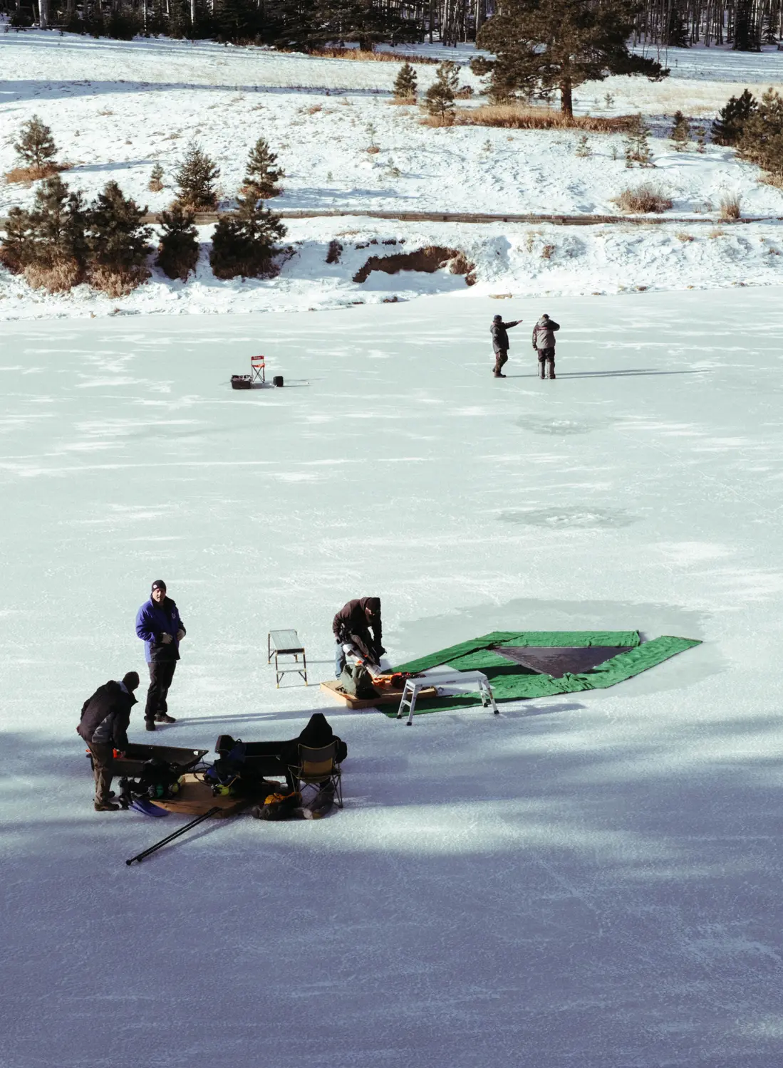 Lake Isabel froze over the night before, allowing the divers to earn their certifications. Photo: Peter Vo, Rocky Mountain PBS
