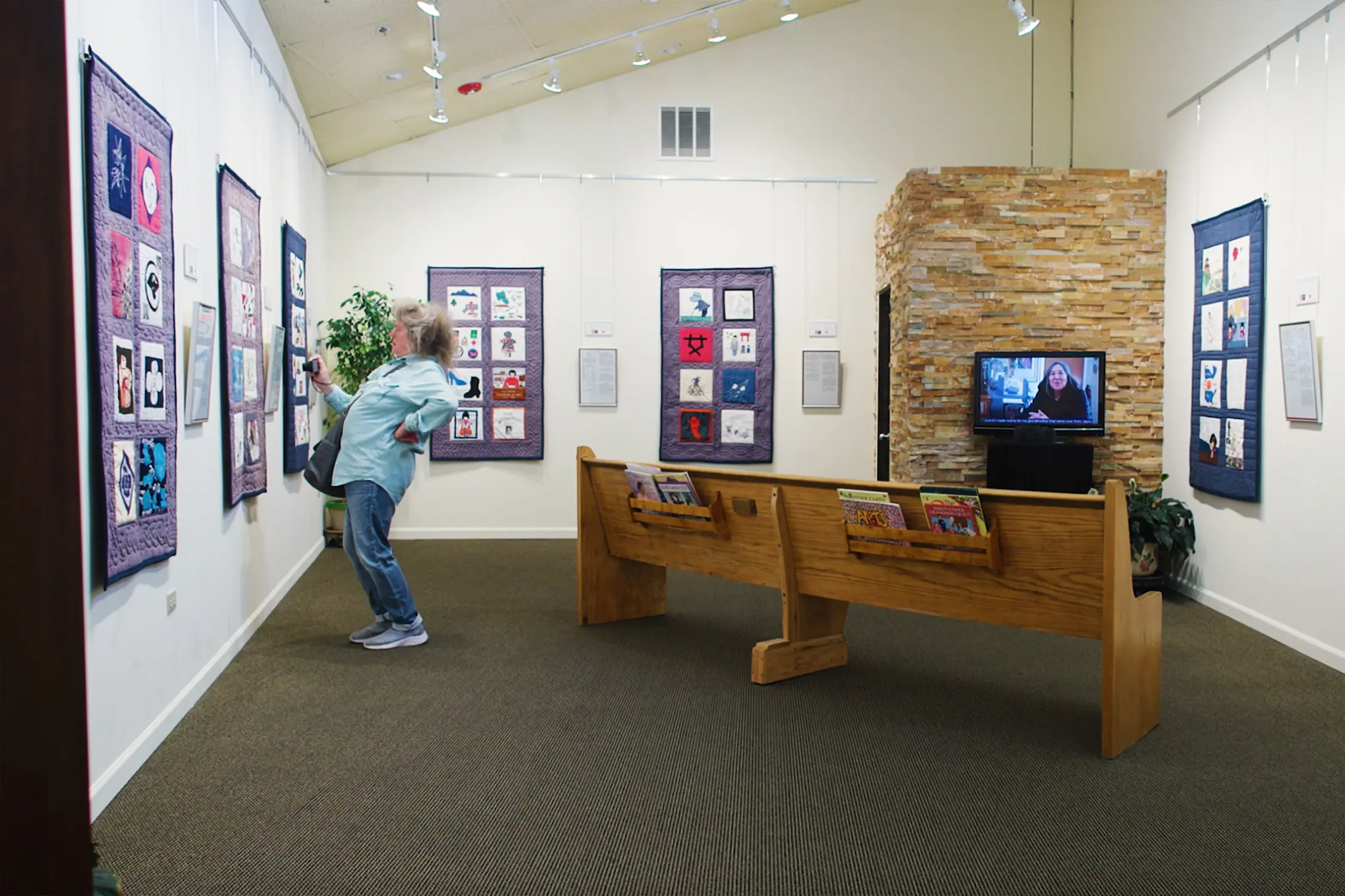 The full quilts, which were designed to resemble scrolls, are part of a special exhibit at the Rocky Mountain Quilt Museum. Photo: Chase McCleary, Rocky Mountain PBS