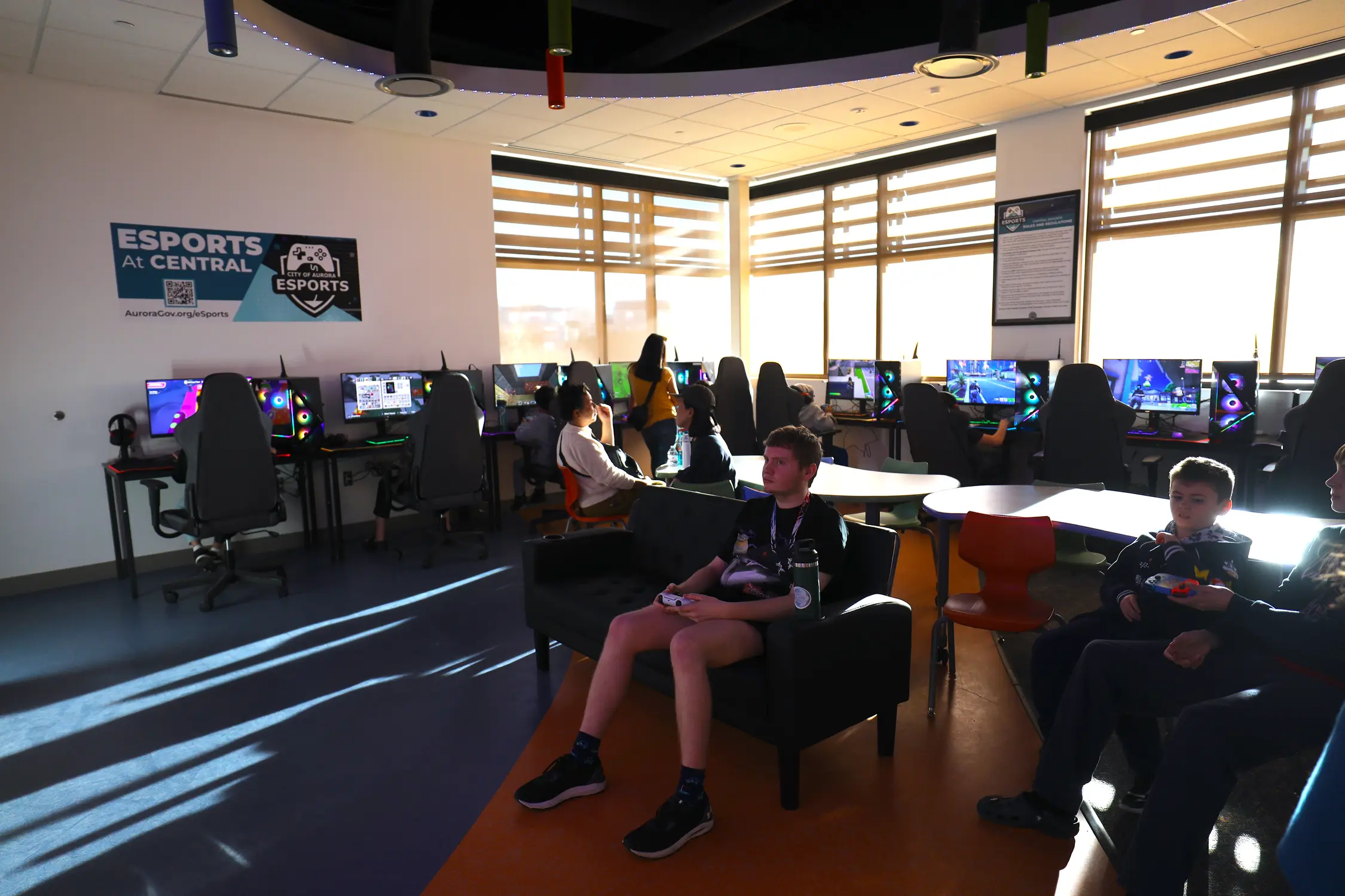 Looking for a gaming console? At the Central Recreation Center, you'll have to wait your turn. It was a full house at Monday's grand opening. Photo: Sarah Shoen, Rocky Mountain PBS