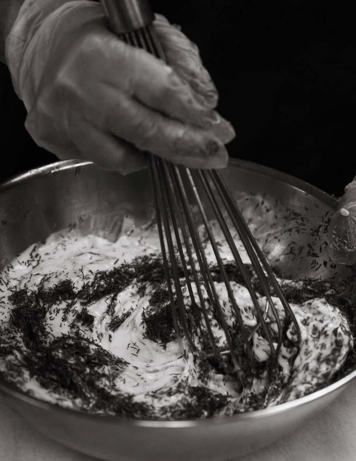 Tzatziki made in the central kitchen. Many sauces are made in bulk before going out to the schools. Photo: Peter Vo, Rocky Mountain PBS