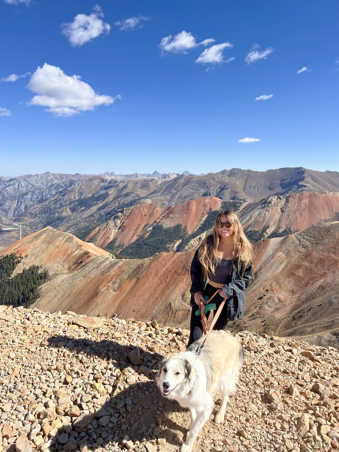 JJ Caric hiking with her dog