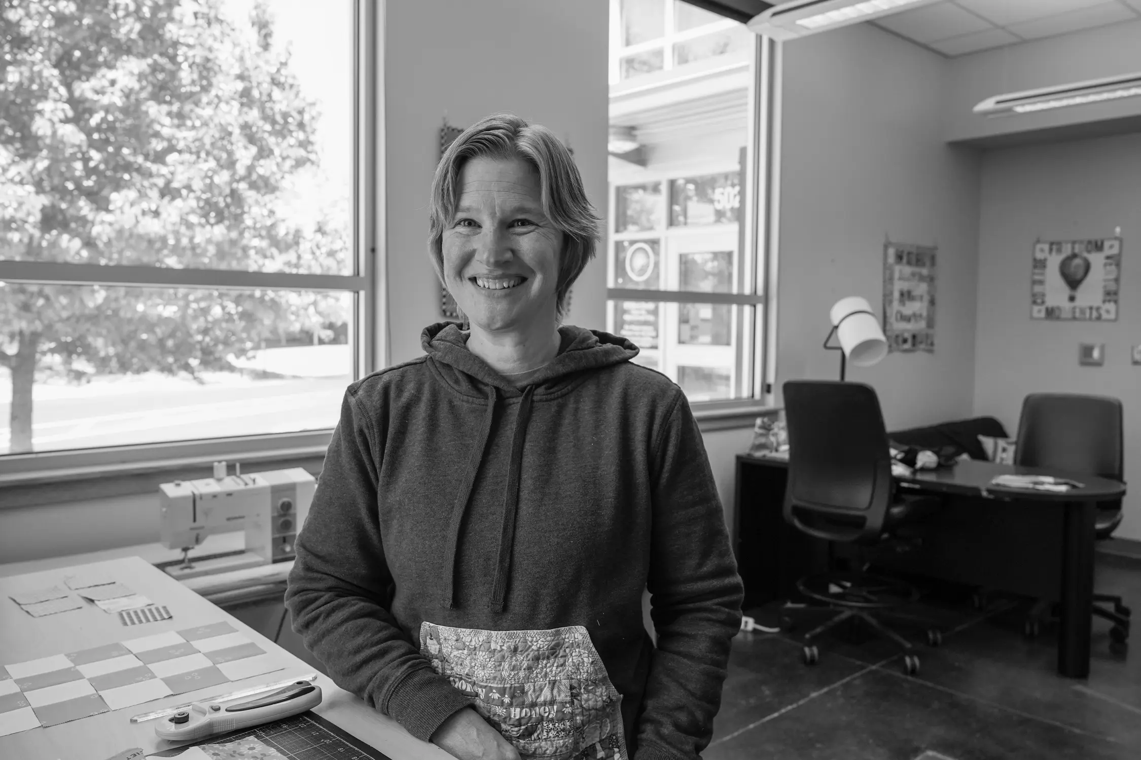 The studio space is decorated with mini quilts Powell received through swaps on Instagram, where the modern quilt community is constantly buzzing with questions about where people got their fabrics. Photo: Joshua Vorse, Rocky Mountain PBS