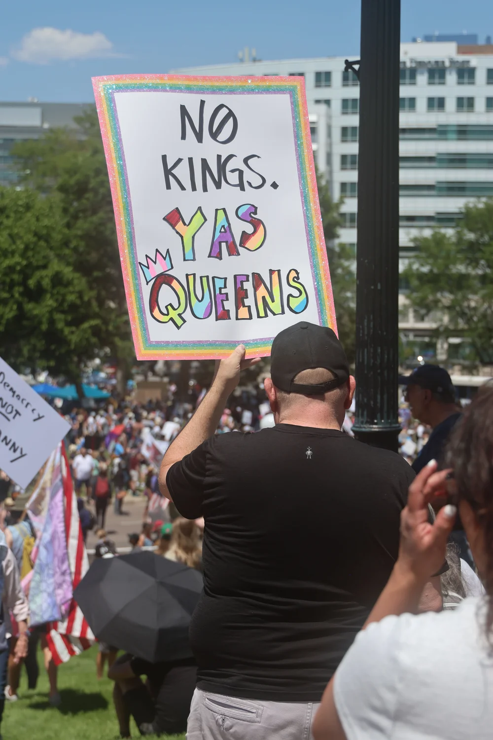 Many protest signs in Denver celebrated the LGBTQ+ community. Photo: Kyle Cooke, Rocky Mountain PBS
