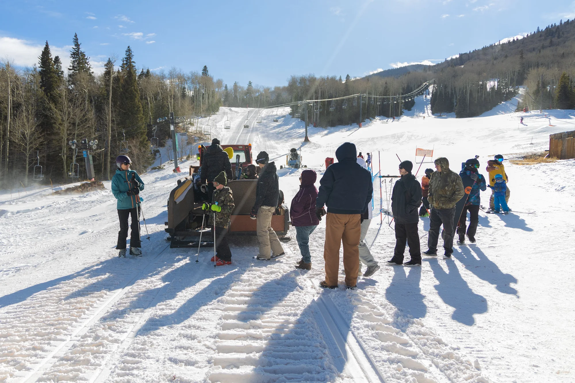 Visitors load into the Cuchara Mountain Park’s Ski Bus, which takes skiers and snowboarders on a short ride to the top of the ski hill.  Photo: Chase McCleary, Rocky Mountain PBS