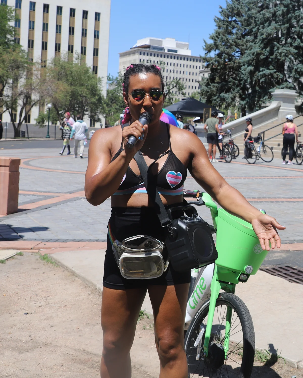 Maya Blasingame speaks in support for transgender youth at a protest outside the Colorado Capitol. Photo: Alec Berg, Rocky Mountain PBS