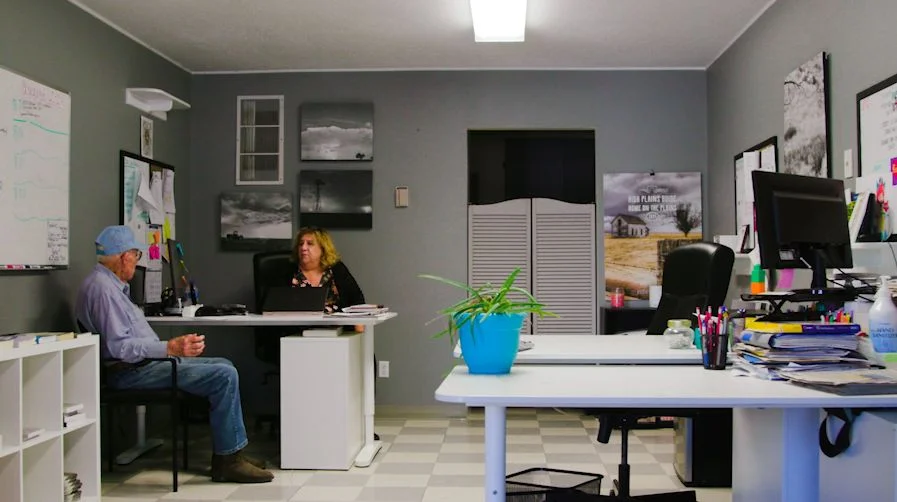 Bob (left) sits for a chat with Barnett (right) while renewing his subscription. Photo: Chase McCleary, Rocky Mountain PBS