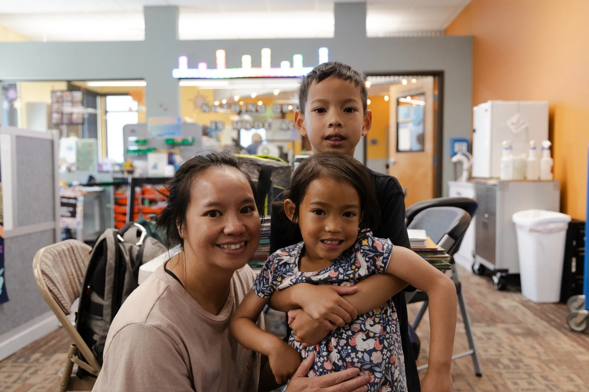 Emma (4) and Aiden (6) said that they enjoy the play spaces most, such as the outdoor model truck area and the play kitchen. Photo: Chase McCleary, Rocky Mountain PBS