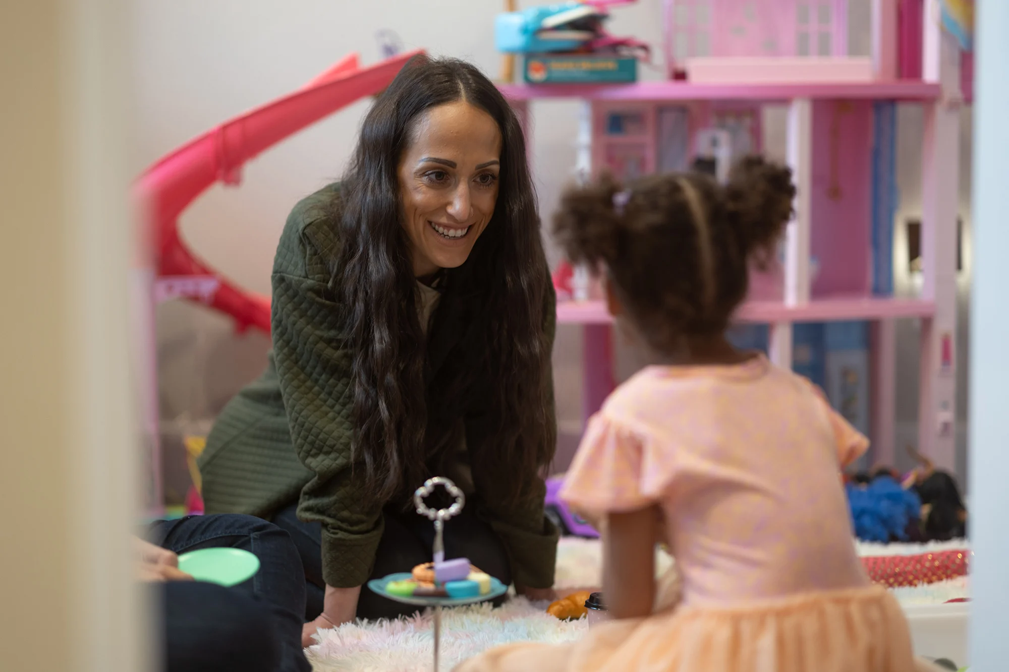 Miranda Spencer plays with her daughter at their home in Denver. Photo: Jeremy Moore, Rocky Mountain PBS
