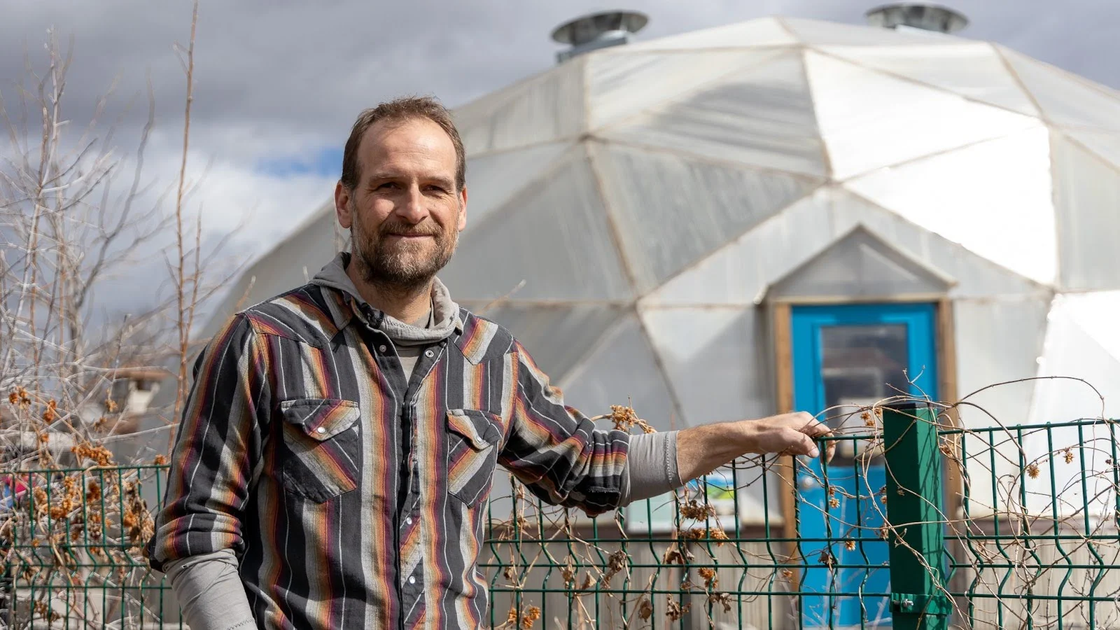 Keith Bruno in front of the dome. Photo: Ziyi Xu, Rocky Mountain PBS