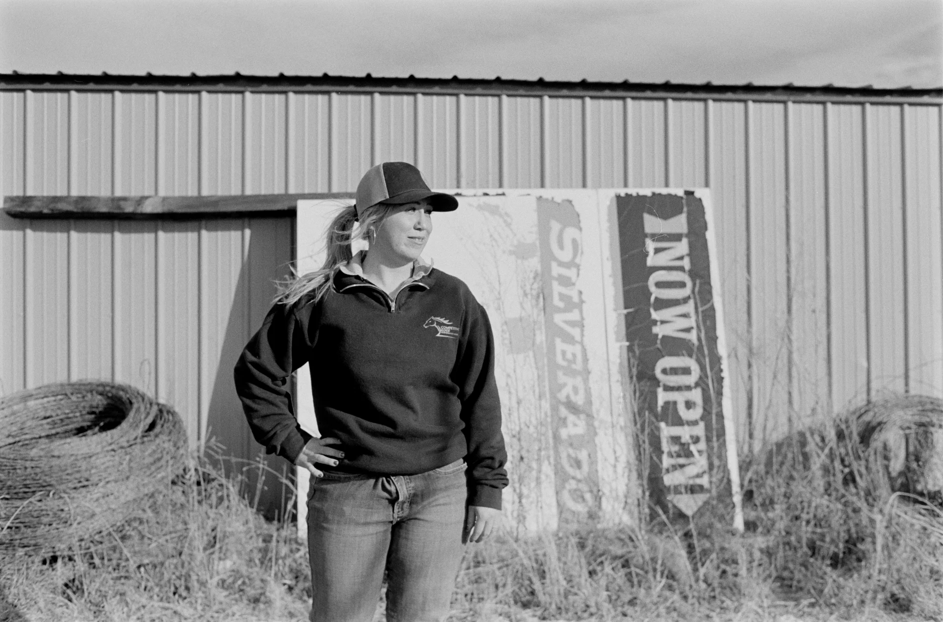 Samantha Pike, 25, of Fountain, Colorado poses for a portrait at the Silverado Ranch after helping round up a herd of longhorns. Photo: Cormac McCrimmon, Rocky Mountain PBS