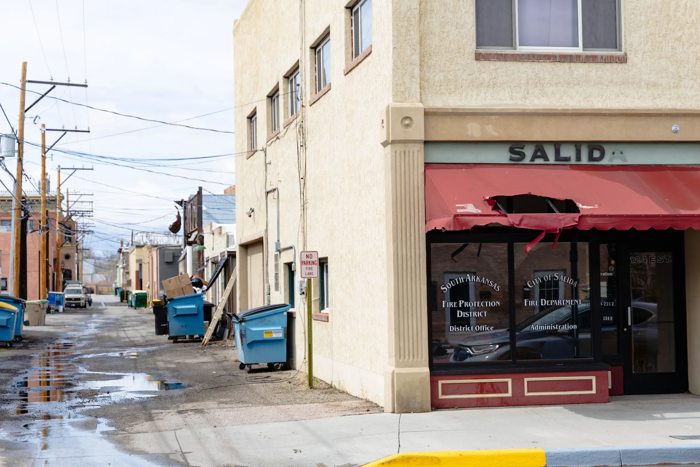 The old Salida Fire Station is mostly empty, save for a few leftover cabinets, old wood furniture and some remaining gear. Photo: Chase McCleary, Rocky Mountain PBS