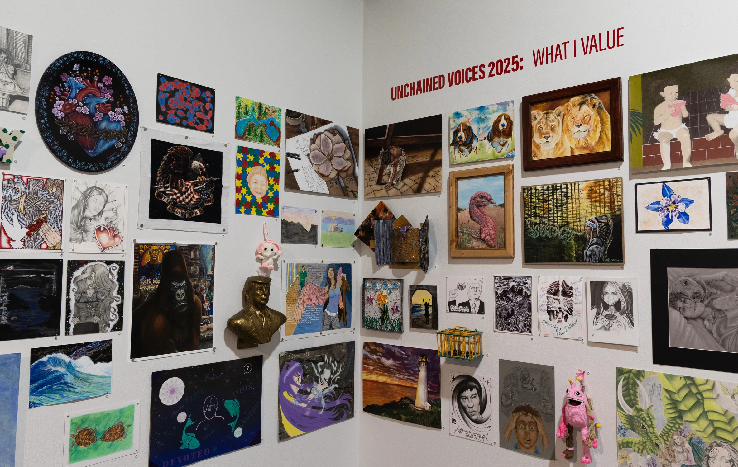 The artwork of more than 100 incarcerated people are featured on the walls of the Unchained Voices installation. Photo: Carly Rose, Rocky Mountain PBS