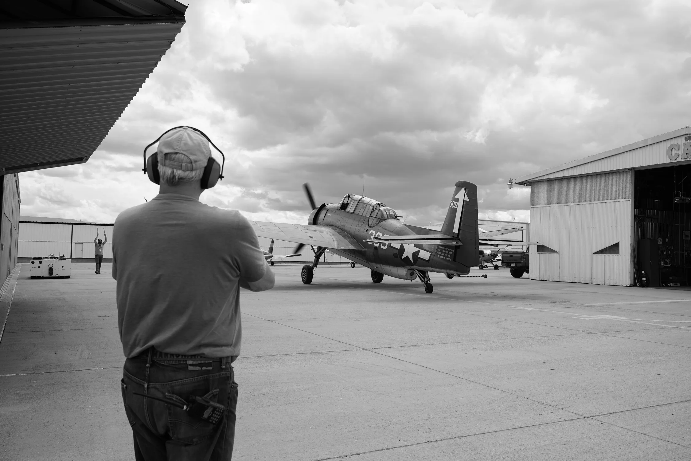“It gets pretty loud,” said Fred Suevel, watching the plane taxi up to the hangar, on an otherwise calm day, the force of the air from the propeller felt like one of the Grand Valley’s spring wind storms. Photo: Joshua Vorse, Rocky Mountain PBS