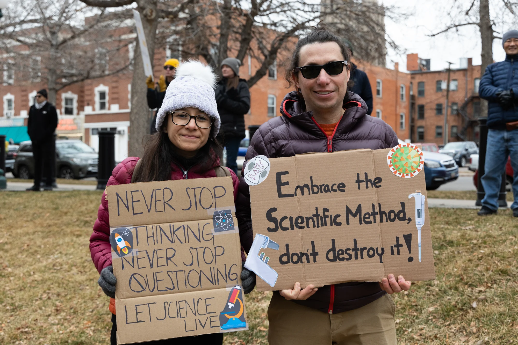 Biomedical scientists Berenice Cabrera and Arturo Barbachano at the “Stand Up for Science” protest March 7. Photo: Carly Rose, Rocky Mountain PBS