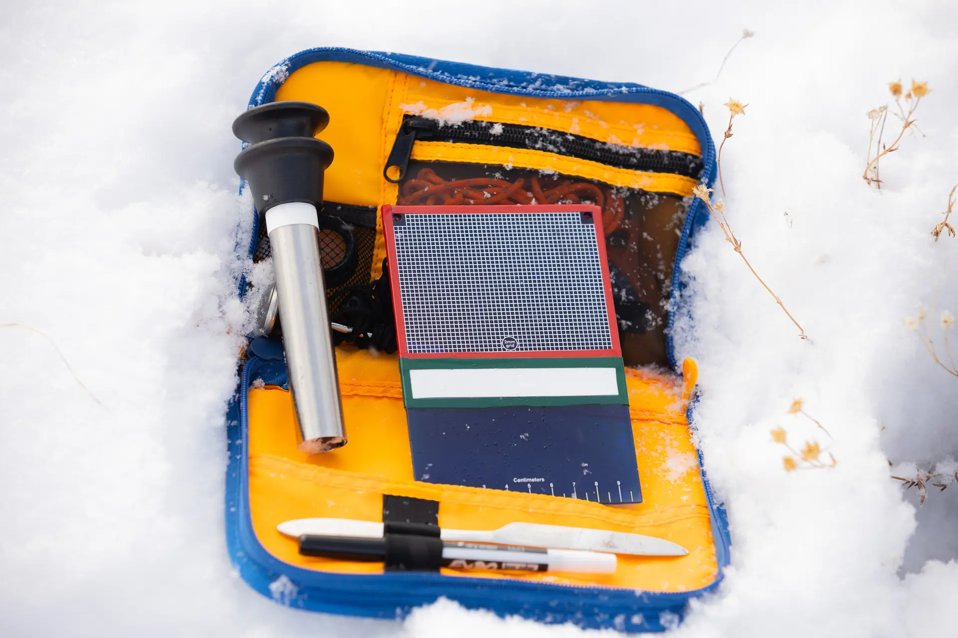 Denny Shaedig’s snow study kit includes an apple corer. Photo: Cormac McCrimmon, Rocky Mountain PBS