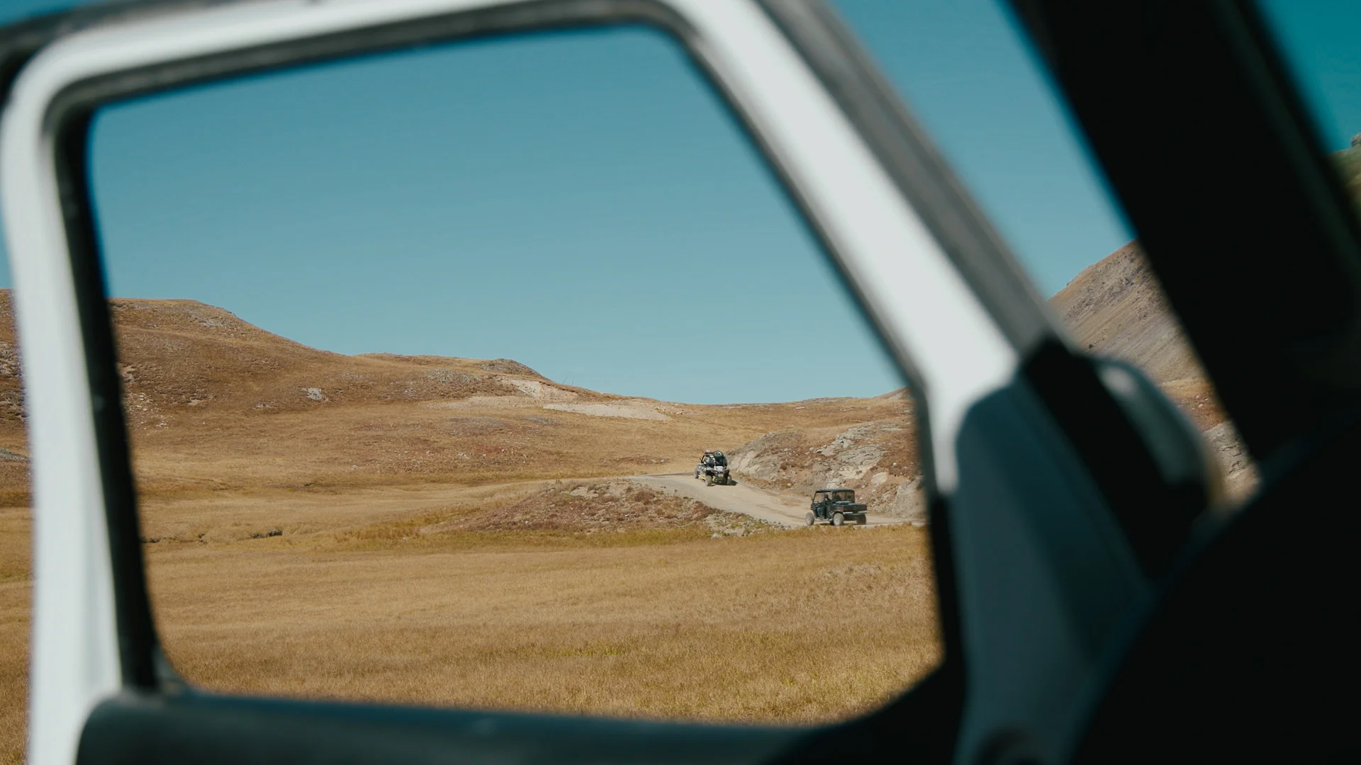 ATVs ascend a dirt road in the San Juan mountains. Etchart said that increased recreation in the area was a major factor in his decision to waive his grazing rights. Photo: Ziyi Xu, Rocky Mountain PBS