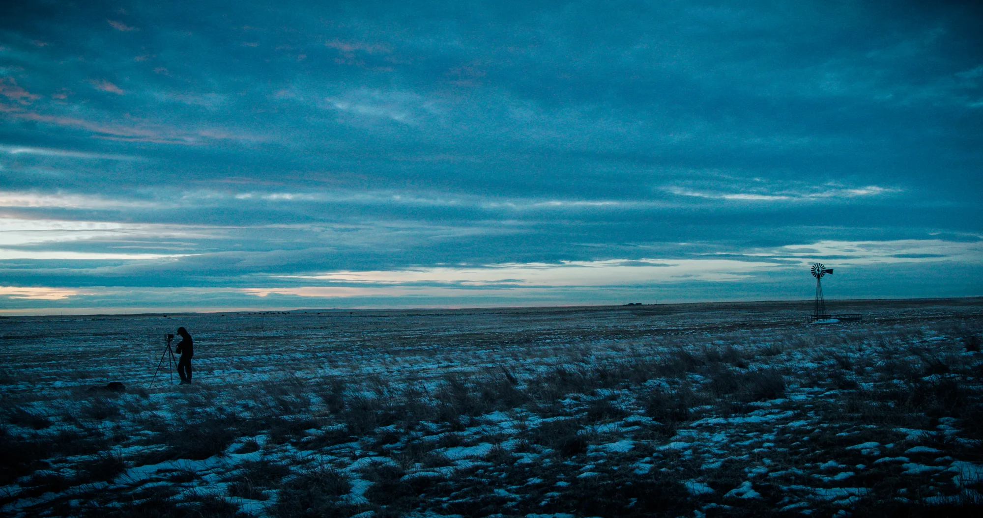 Alex Burke packs his camera during a January photo trip to the Pawnee National Grasslands. Photo: Cormac McCrimmon, Rocky Mountain PBS