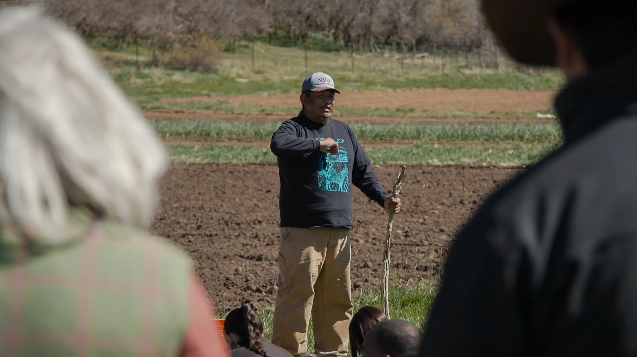 Brandon Francis telling the blue corn story to the group. Photo: Ziyi Xu, Rocky Mountain PBS