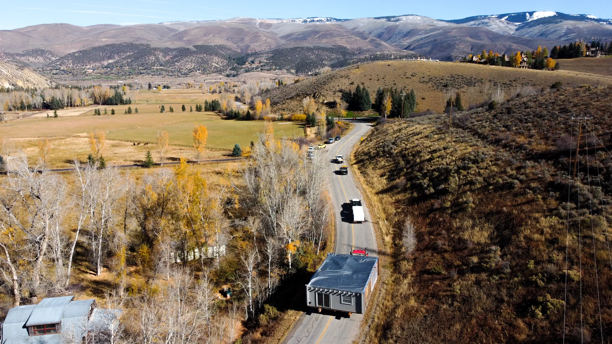 Structural movers navigate the first turns along the route from Edwards, Colorado to Gypsum, Colorado. Photo: Joshua Vorse, Rocky Mountain PBS