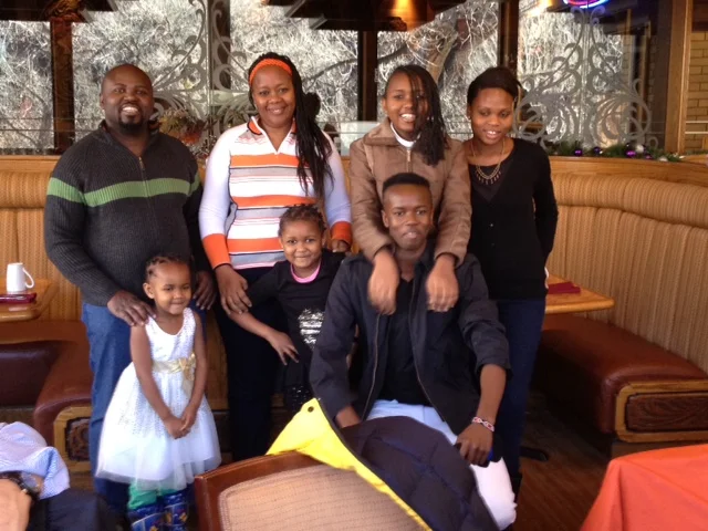 Safari and his family. Photo courtesy of Arnold Safari Ngumbao