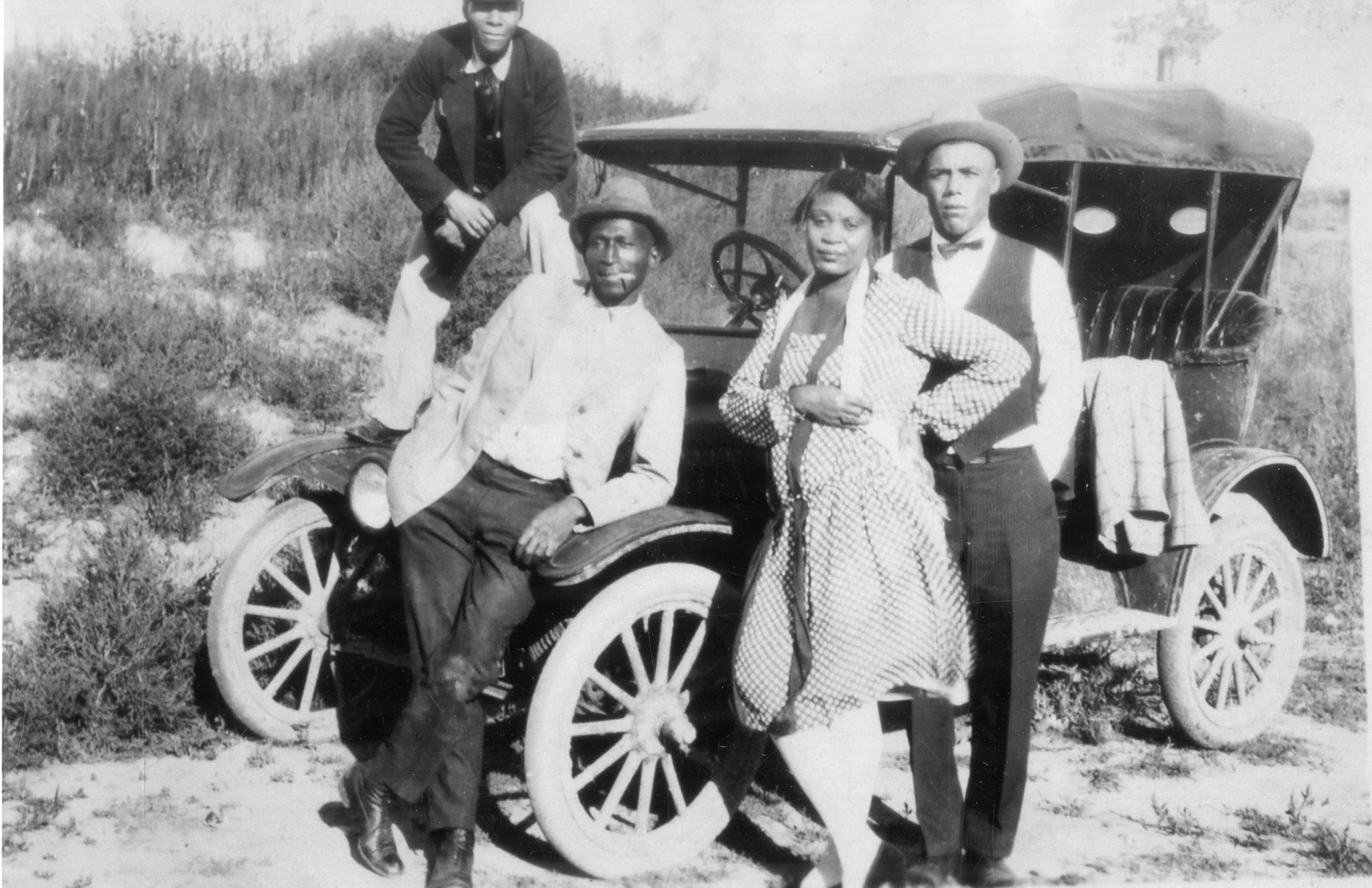 Four visitors to Dearfield ca. 1920s.