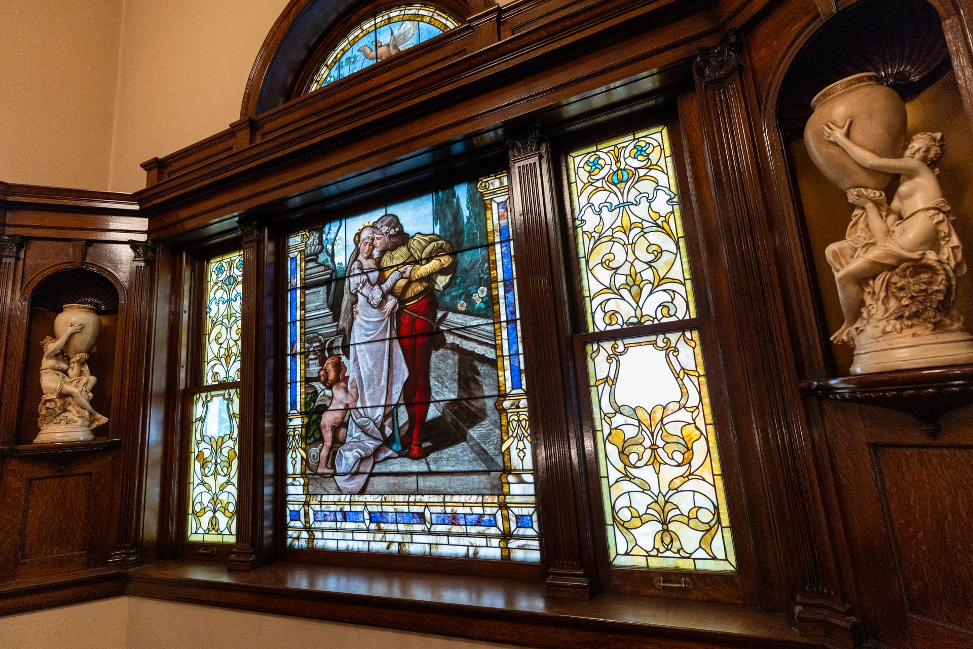 The stained glass windows in the main stairwell leading up from the first floor. Photo: Carly Rose, Rocky Mountain PBS