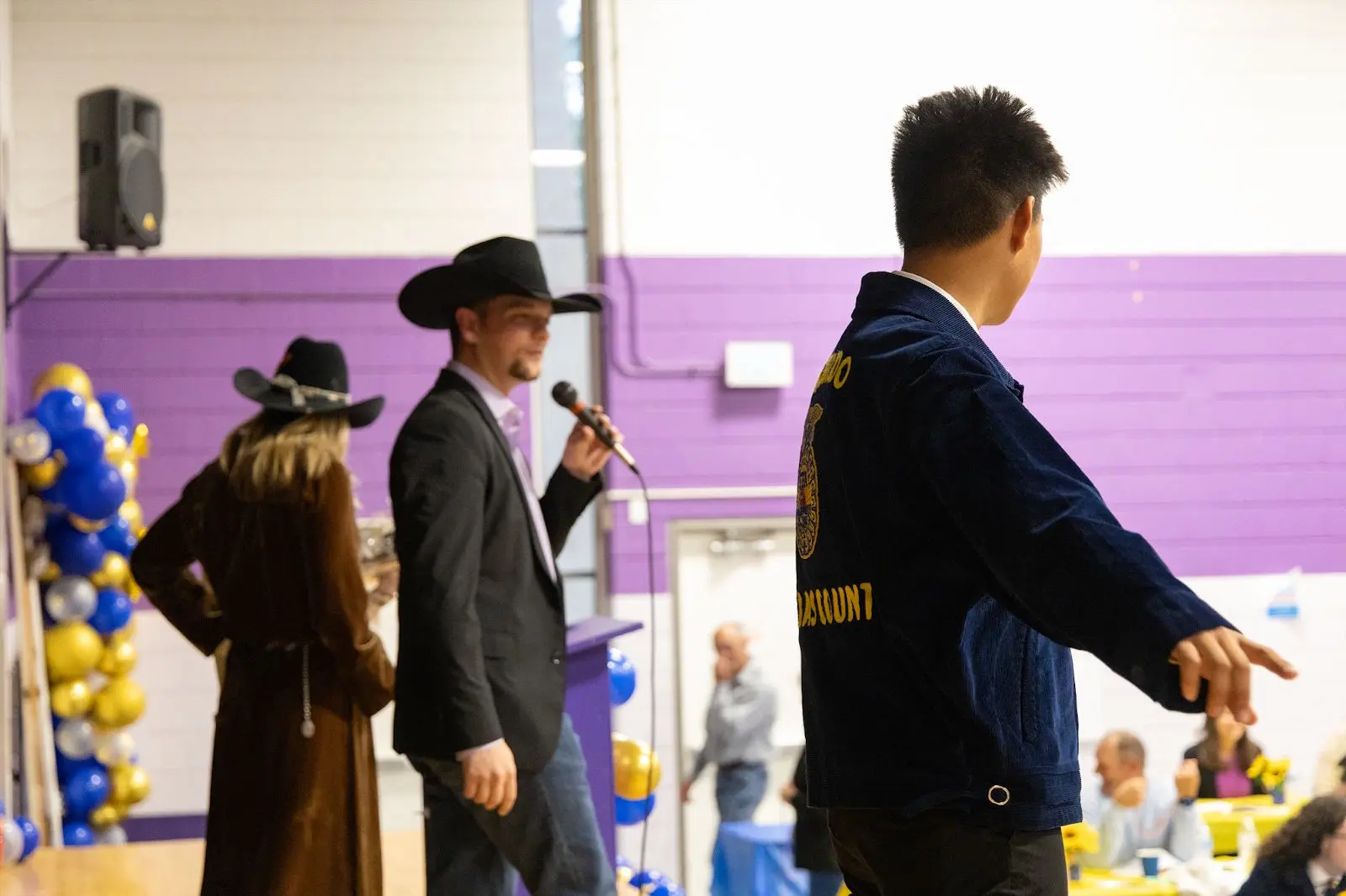 Behr (left), Nighswonger (center) and Lobello (right) all auctioned items at the FFA fundraiser. Photo: Chase McCleary, Rocky Mountain PBS