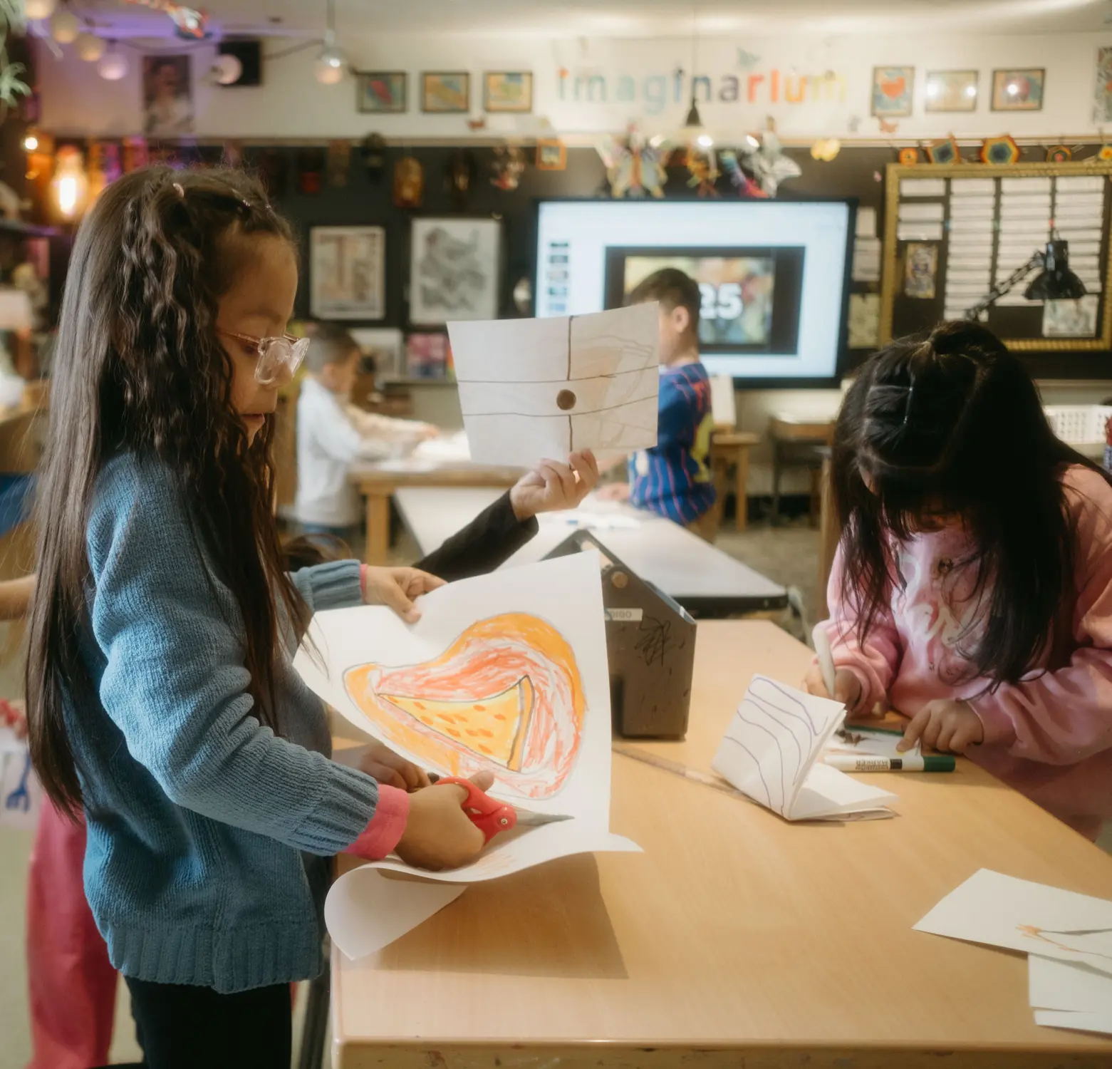 Students work together on masks for the upcoming “Wild Rumpus”. Photo: Peter Vo, Rocky Mountain PBS