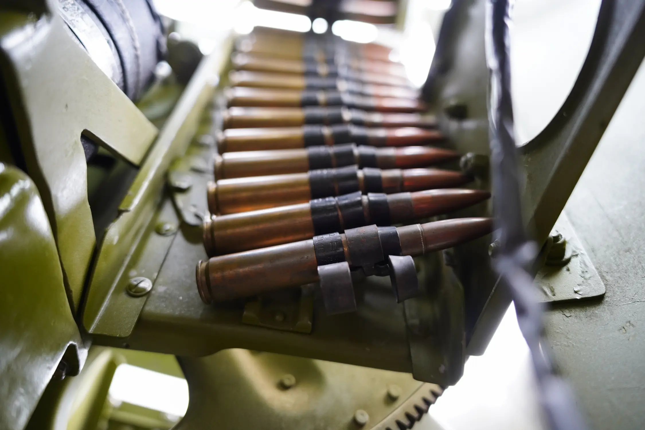 Old ammo sits in the ball turret of the TBM. The original turret was replaced with a sloped glass canopy by the Canadian Navy. CAF members found another turret in the early 1990s and used it to restore the plane to WWII era configuration. Photo: Joshua Vorse, Rocky Mountain PBS