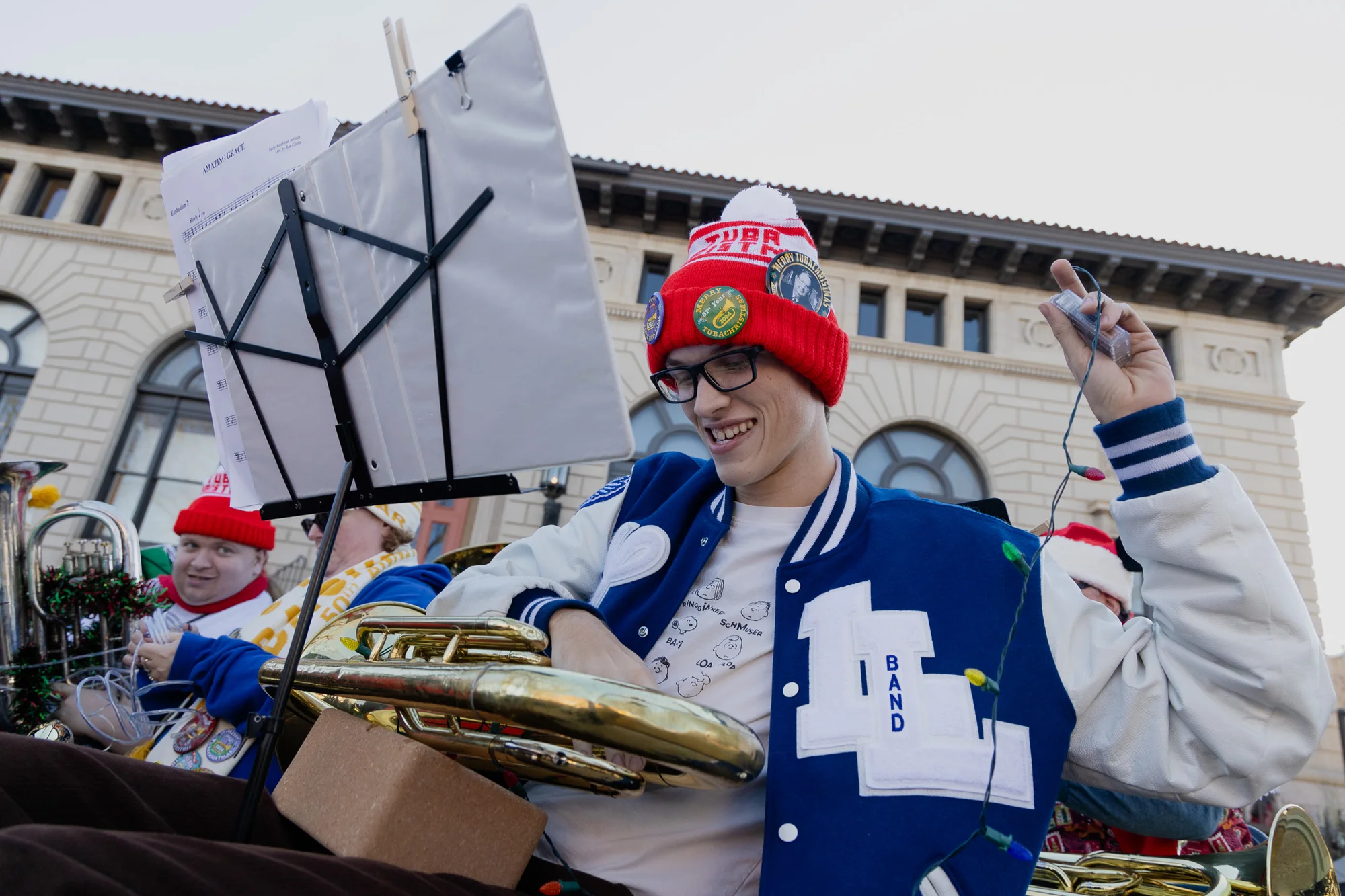 Alexander Parker, 17, of Lyons decorates his tuba with a string of lights. This year was his fourth Tuba Christmas. Photo: Cormac McCrimmon, Rocky Mountain PBS