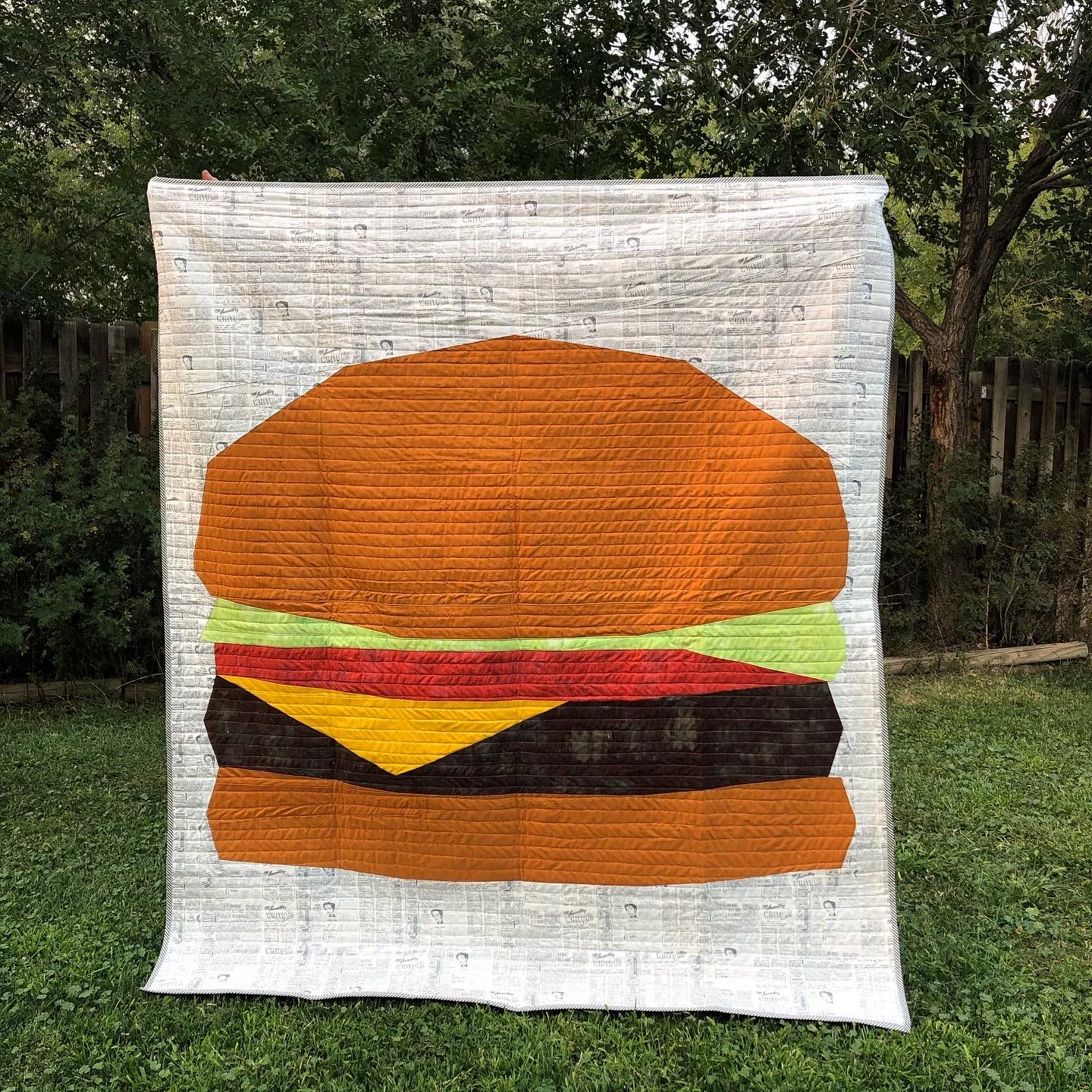 For this quilt, Powell used a six and a half inch pattern of a cheeseburger, and increased the size by 600 percent, so it would fill the whole quilt instead of one block. Photo courtesy Maryanna Powell