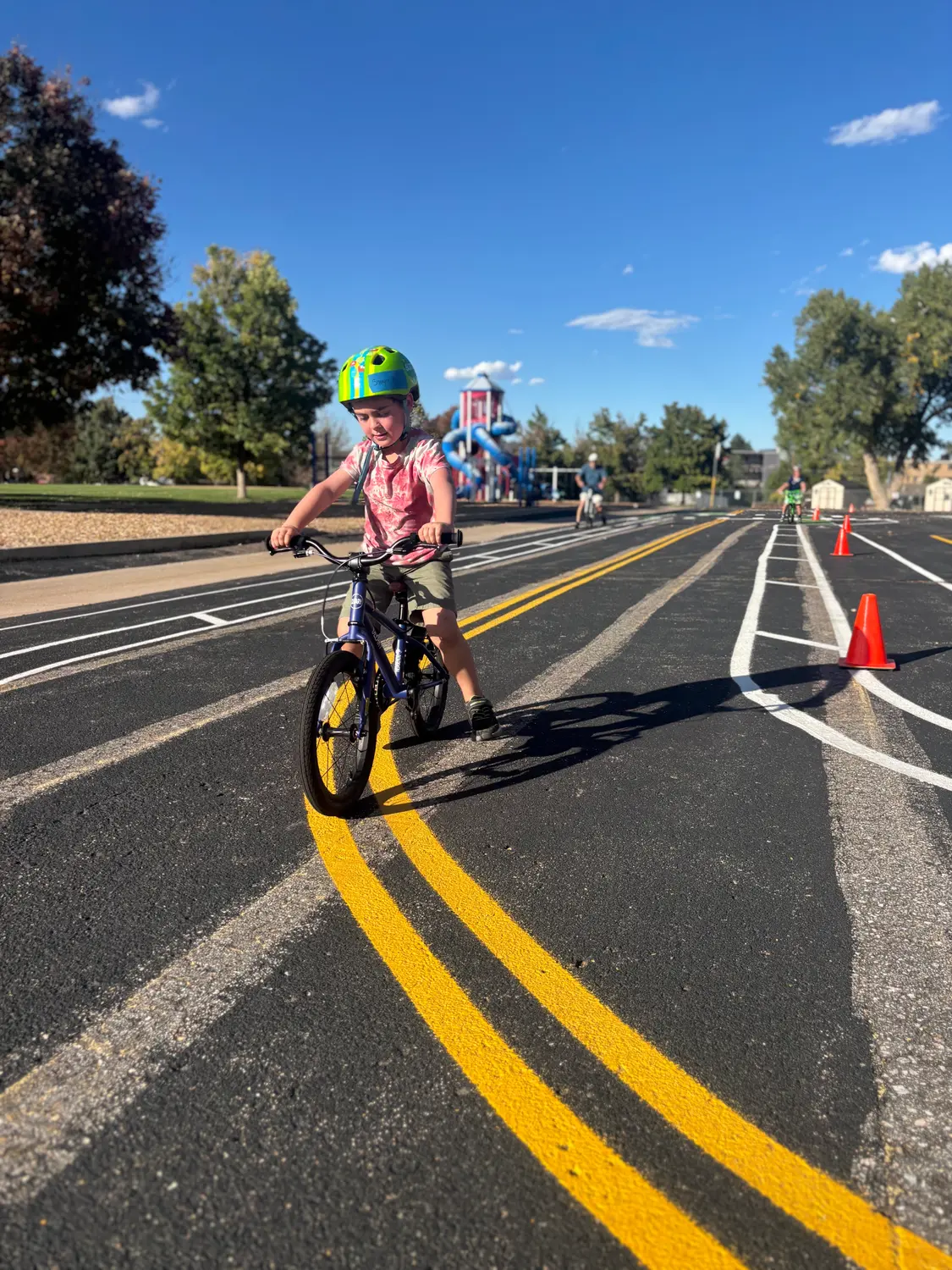Sawyer Harter's first time riding a two-wheeled bicycle at the Littleton Safer Streets Practice Park. Photo: Alec Berg, Rocky Mountain PBS