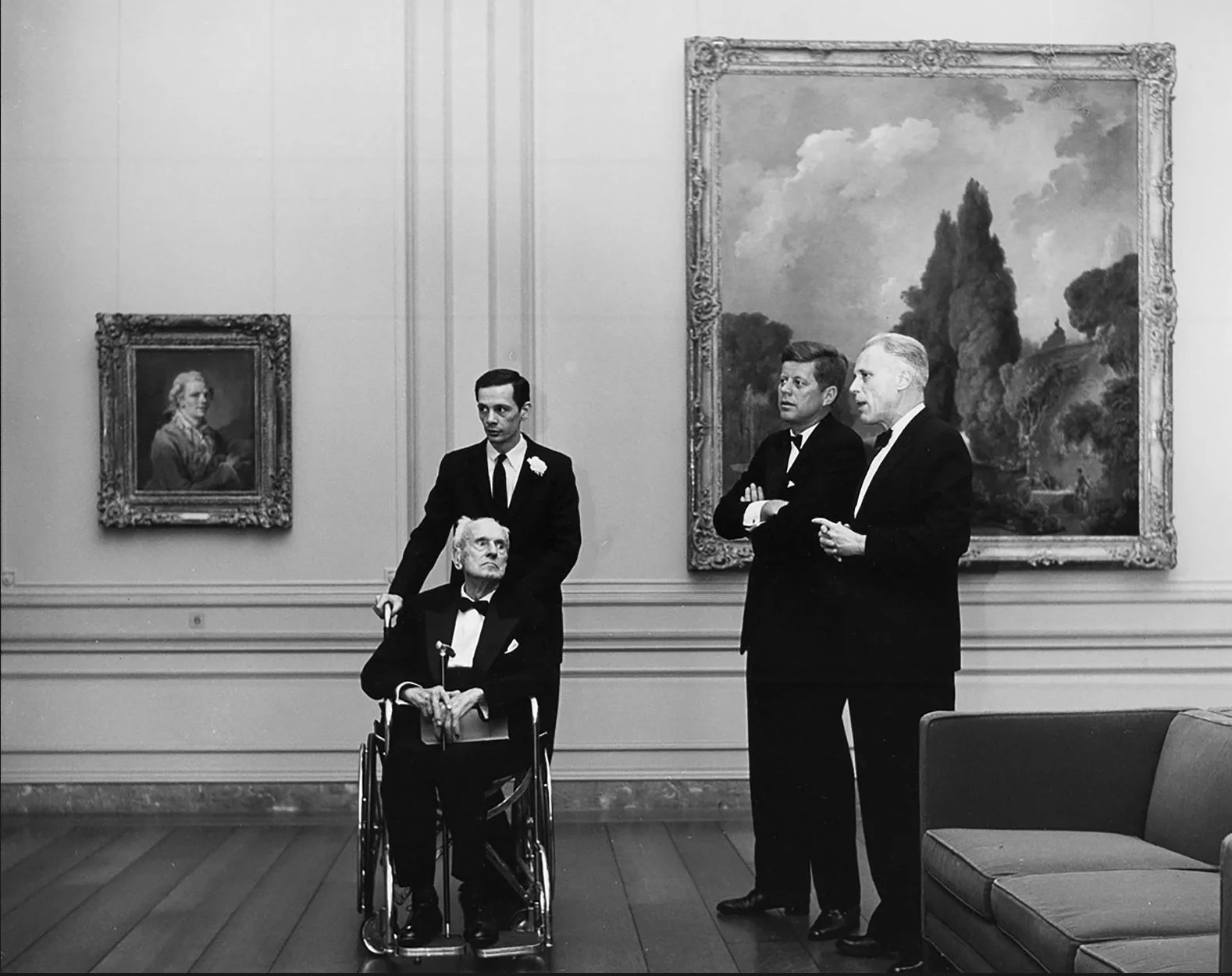 Rush H. Kress, President John F. Kennedy and Chief Curator John Walker at the opening of an exhibition in honor of the distribution of the Kress Collection, Art Treasures for America, at the National Gallery of Art on December 9, 1961.  Photo courtesy the Samuel H. Kress Foundation Archive