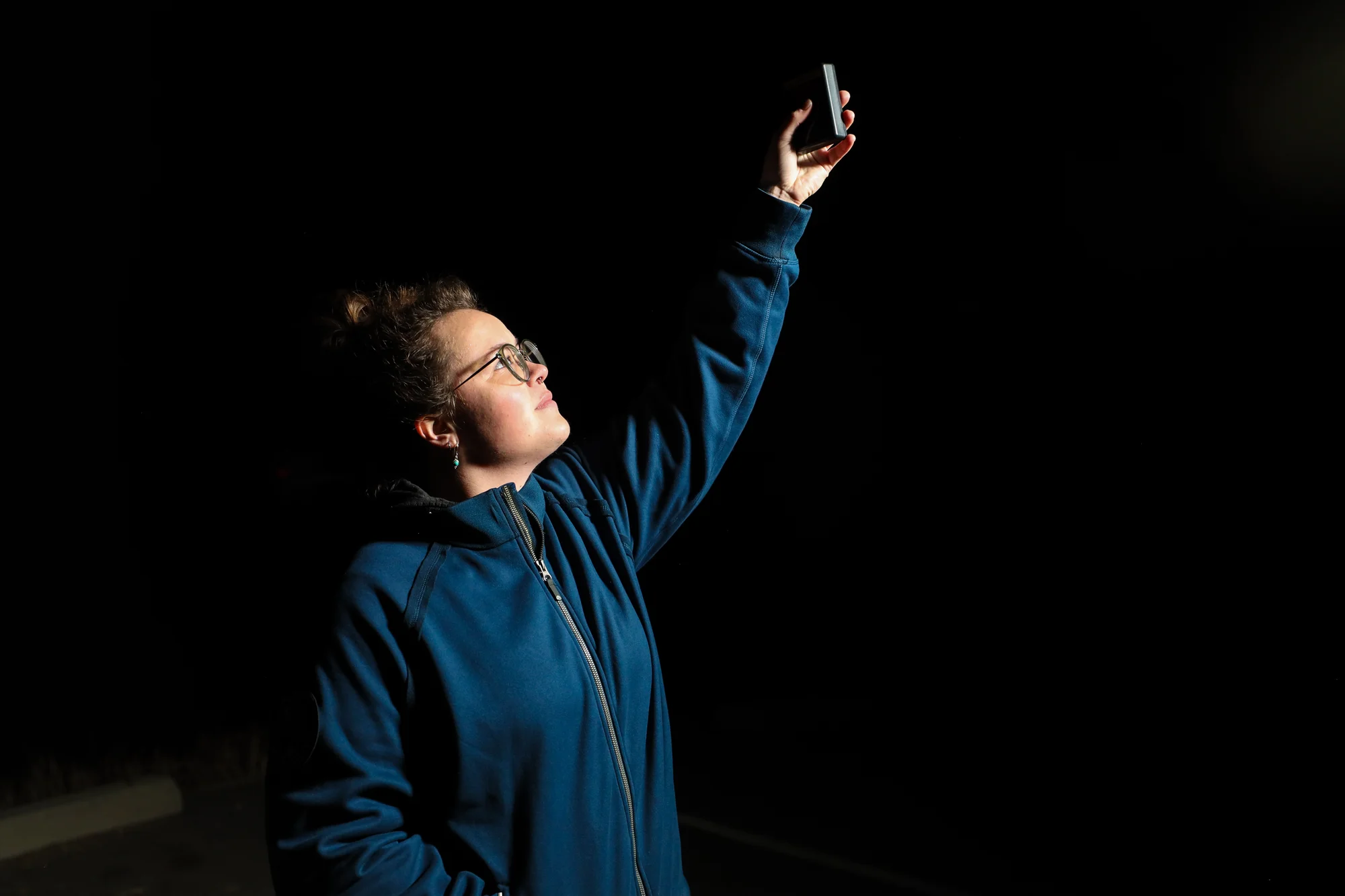 Bronwyn Phillips uses a sky quality meter to test the night sky at Golden Gate Canyon State Park in February. Photo, Cormac McCrimmon, Rocky Mountain PBS