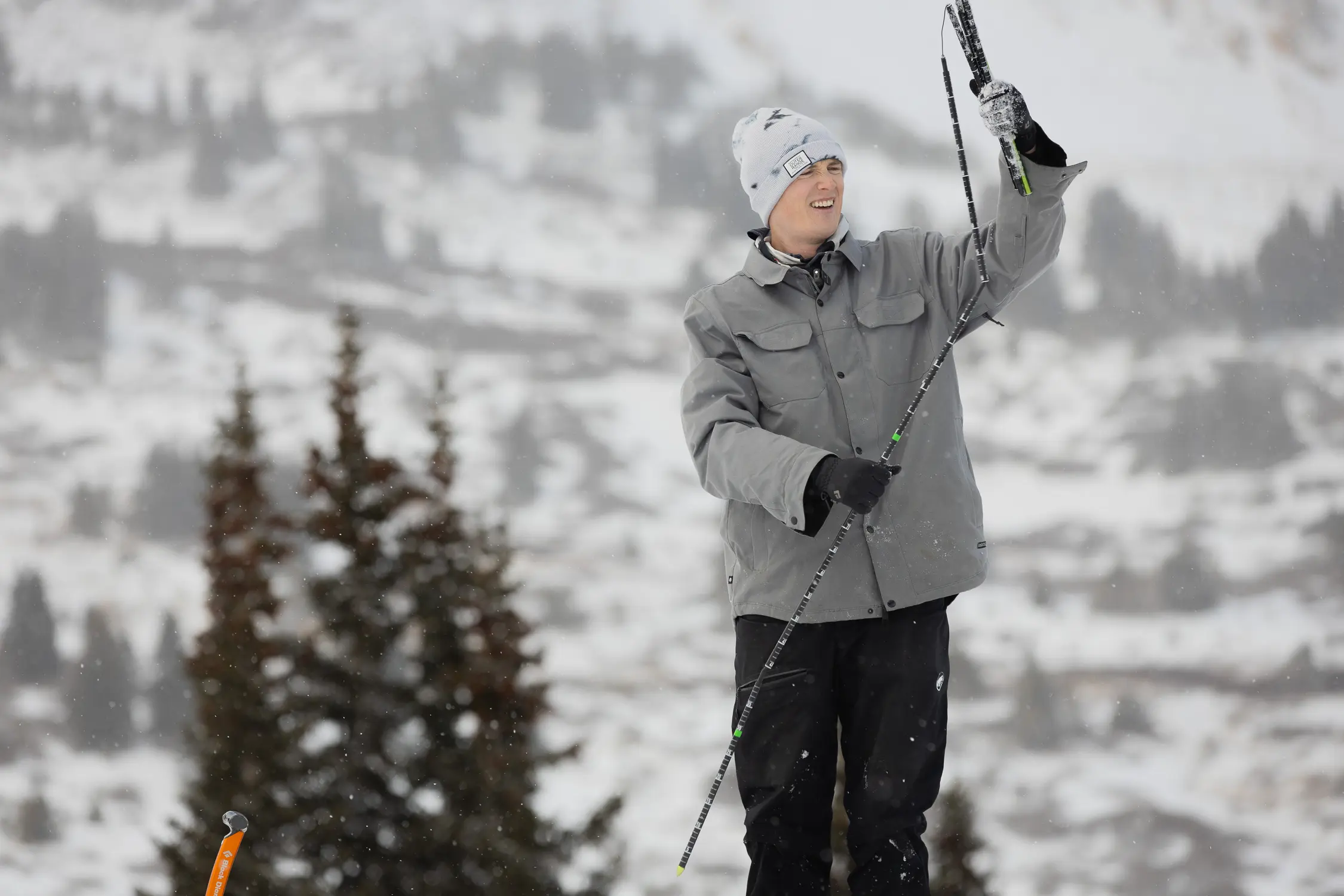 Denny Shaedig uses an avalanche rescue probe to measure the snow depth during a late-November outing. Photo: Cormac McCrimmon, Rocky Mountain PBS