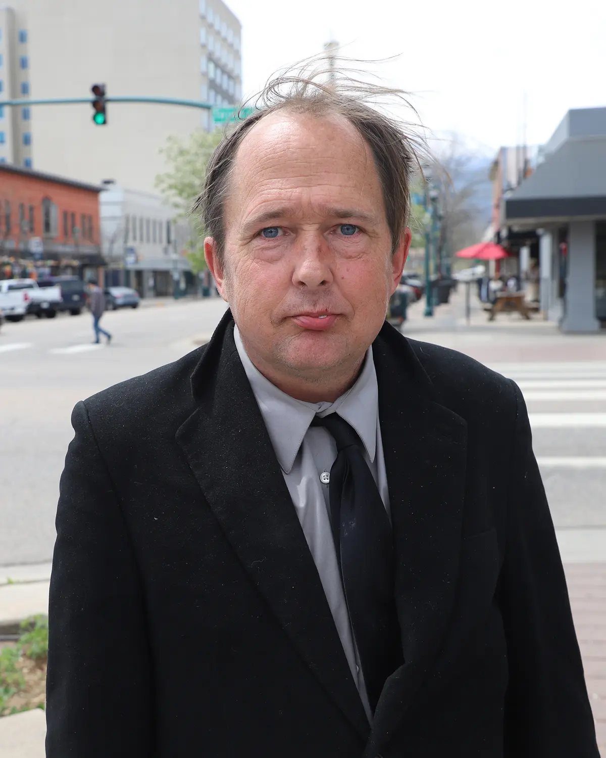 Andrew Resgern, who is unhoused, and said he sometimes has to use the bathroom behind dumpsters because he can't afford to buy an item each time he needs to go and free public restrooms are hard to come by. Photo: Alec Berg, Rocky Mountain PBS