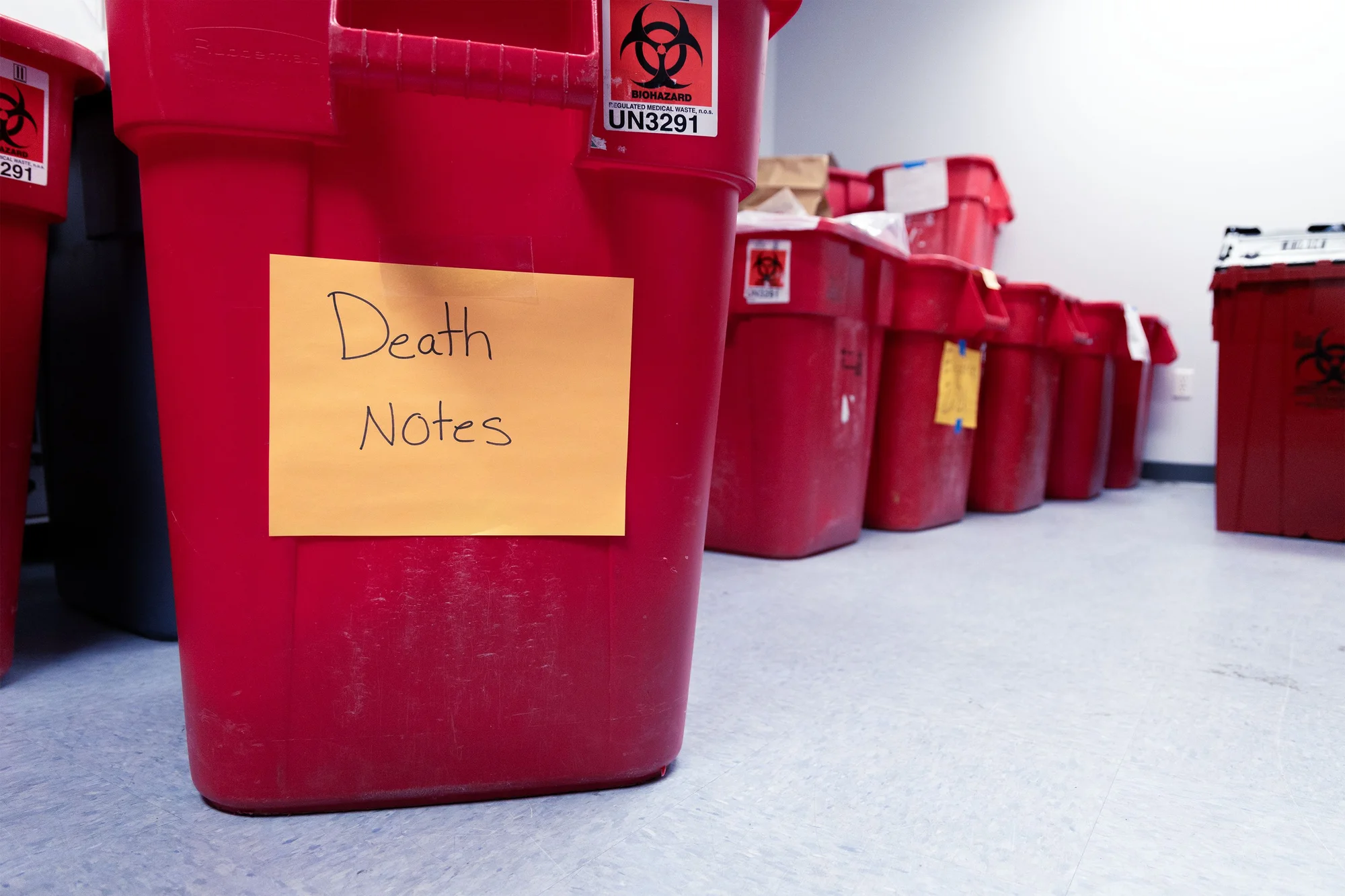 Kelly has read through tubs of death notes throughout his tenure, a requirement when conducting an autopsy.  Photo: Chase McCleary, Rocky Mountain PBS