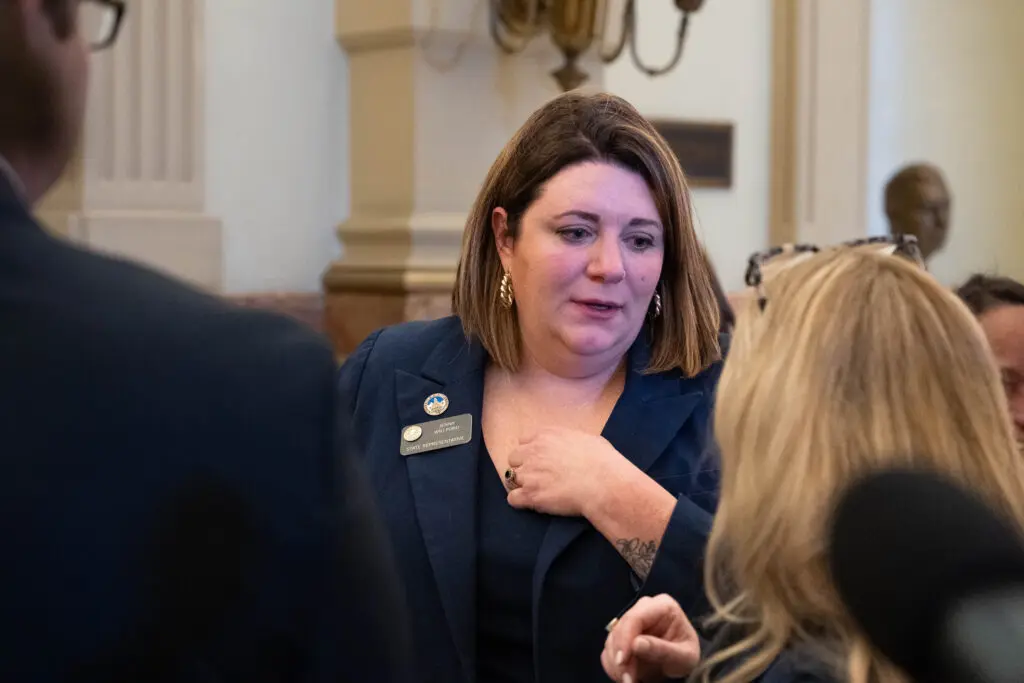 Democratic state Rep. Jenny Willford at the press conference on Jan. 14, 2025, announcing her lawsuit against the rideshare company Lyft. Willford says she was attacked by a driver fraudulently using someone else's profile. Photo: Lucas Brady Woods, KUNC