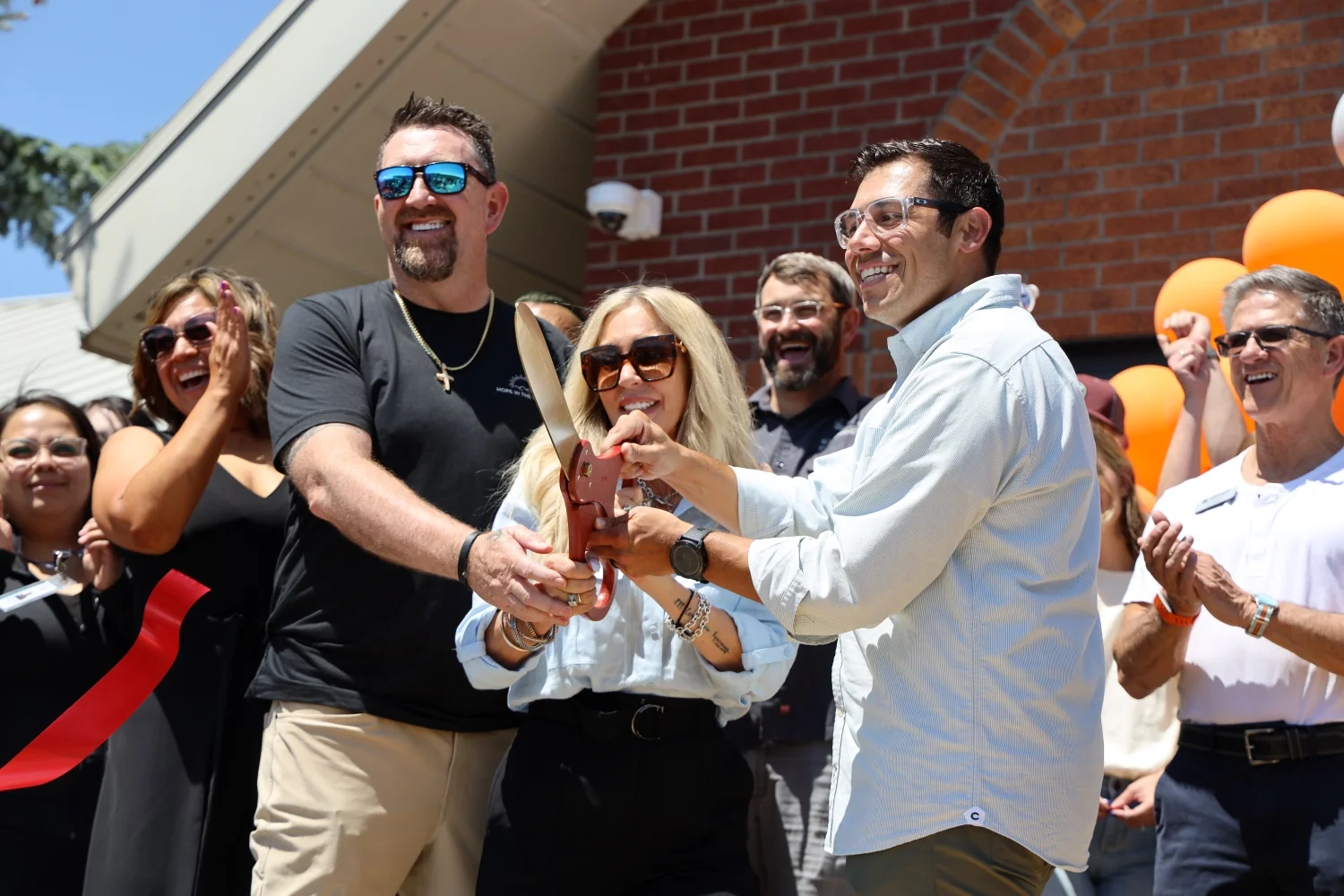 From left to right: Founders Paul Reed and Kim Reed alongside CEO Justin Luke Riley cutting the ribbon to Hope in the Valley. Photo: Seth Jahraus, Rocky Mountain PBS