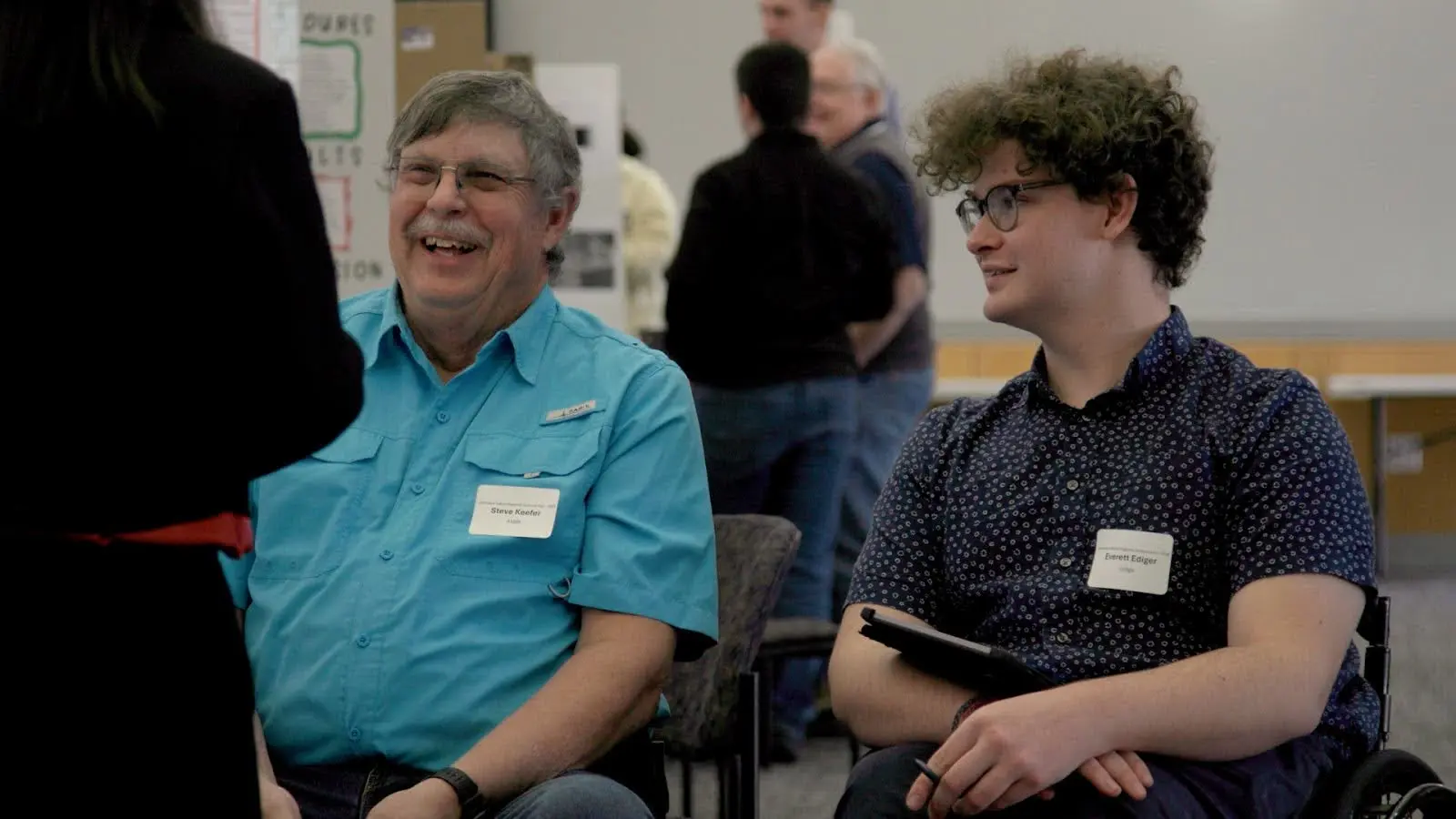 Judges Steve Keefer and Everett Everett Ediger speak with a student about their project. Photo: Chelsea Casabona, Rocky Mountain PBS