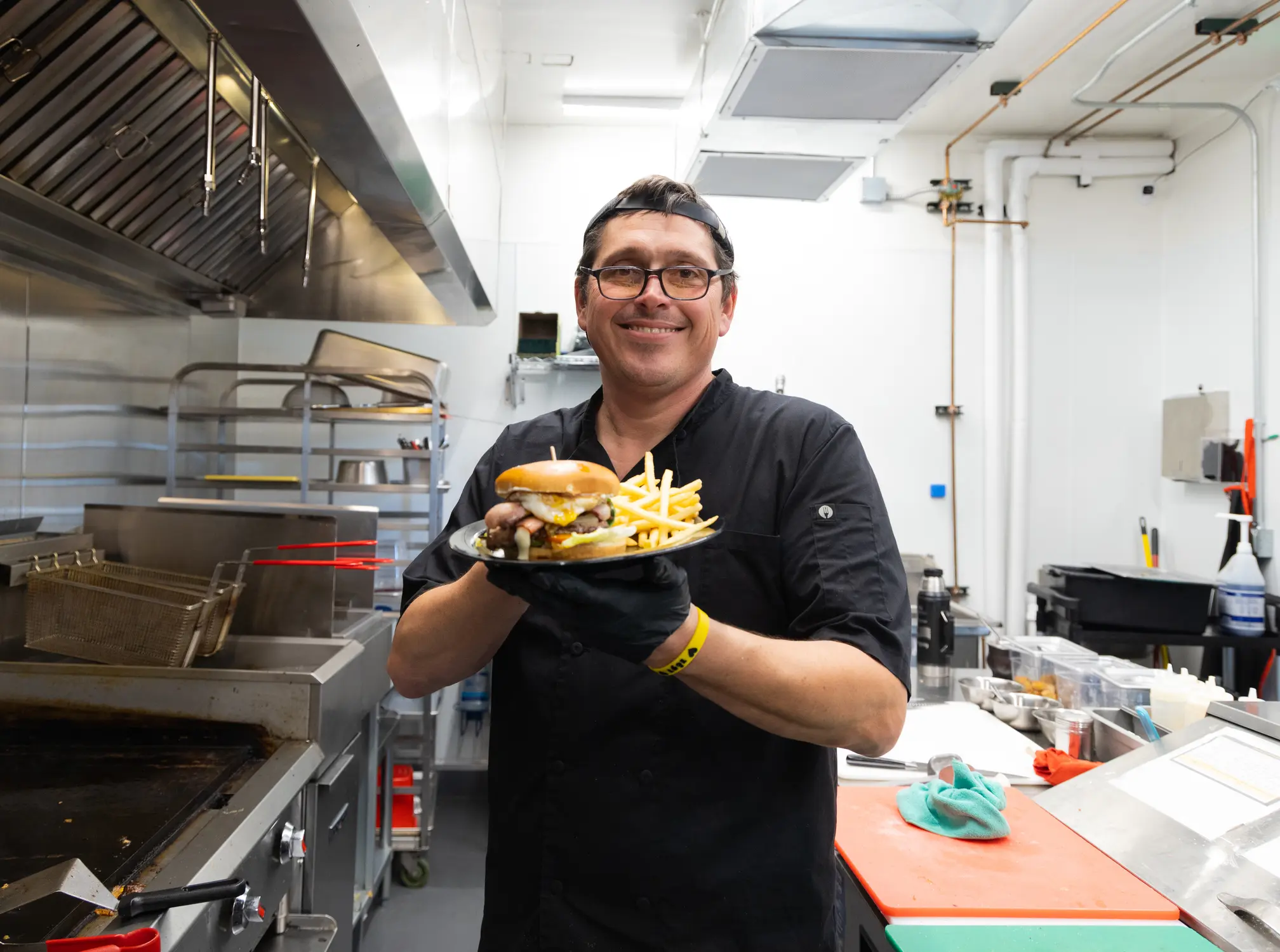Marcelo Alvariza serves empanadas and sandwiches, including the chivito, the national sandwich of Uruguay, at his Aurora restaurant, Orejano. Photo: Carly Rose, Rocky Mountain PBS.