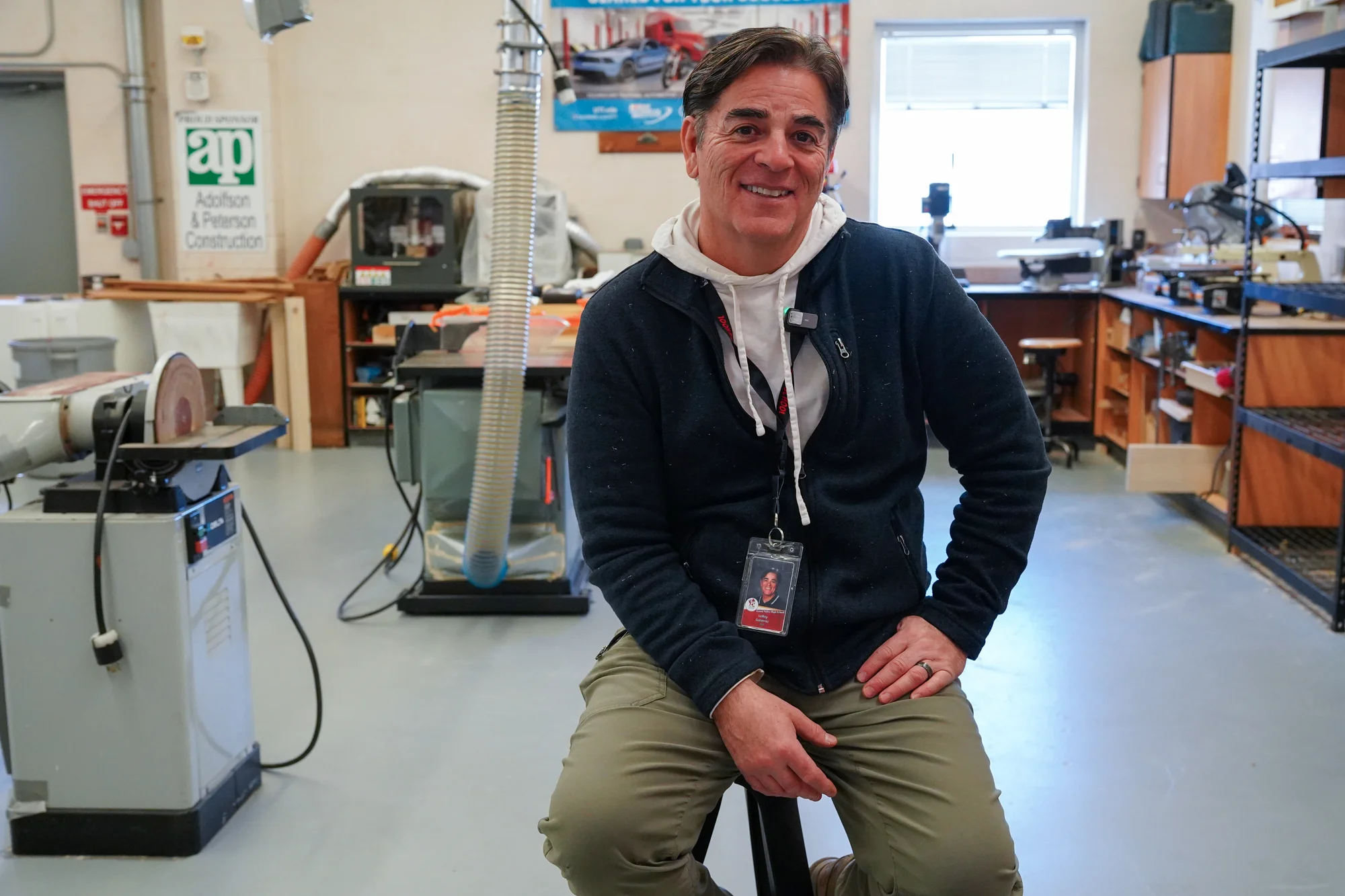 Instructor LeRoy Gutierrez poses in the workshop at the high school. When it's too cold to work outside, students study OSHA safety standards and do other classwork related to the trades in the shop. Photo: Joshua Vorse, Rocky Mountain PBS