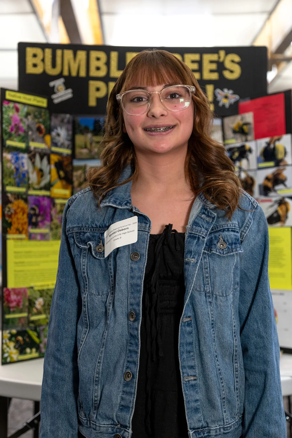 Kendyl Osborn, an eighth grader from La Junta, predicted that she would be able to find more bumblebees on native flowers, rather than invasive flowers in southeastern Colorado. Osborn won the NOAA 2026 Taking the Pulse of the Planet Award. Photo: Chelsea Casabona, Rocky Mountain PBS