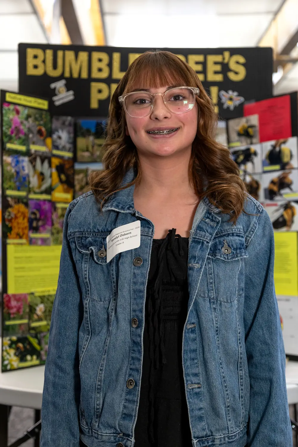 Kendyl Osborn, an eighth grader from La Junta, predicted that she would be able to find more bumblebees on native flowers, rather than invasive flowers in southeastern Colorado. Osborn won the NOAA 2026 Taking the Pulse of the Planet Award. Photo: Chelsea Casabona, Rocky Mountain PBS