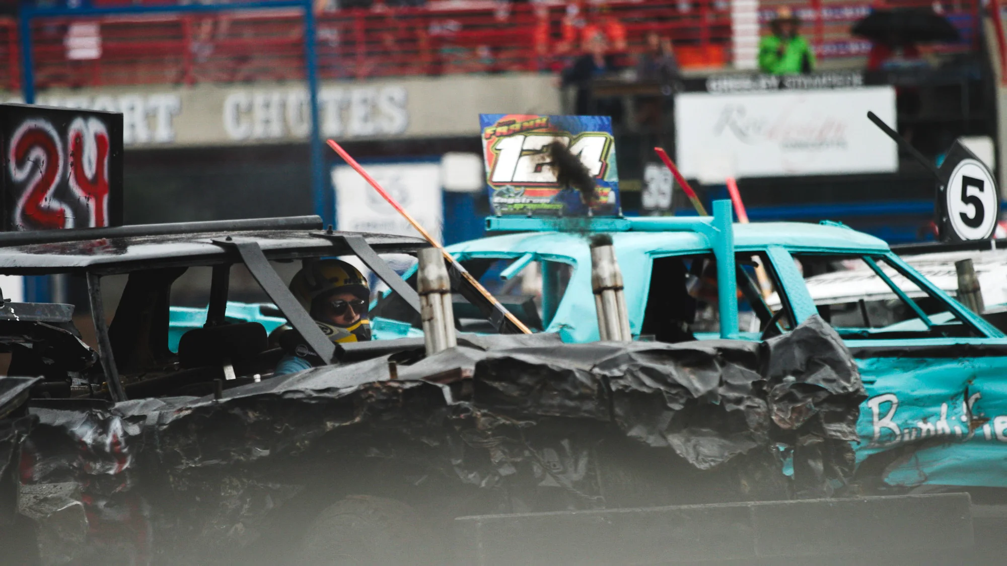 BJ Wangerow fiddles with her engine, but the car won’t budge. Photo: Cormac McCrimmon, Rocky Mountain PBS