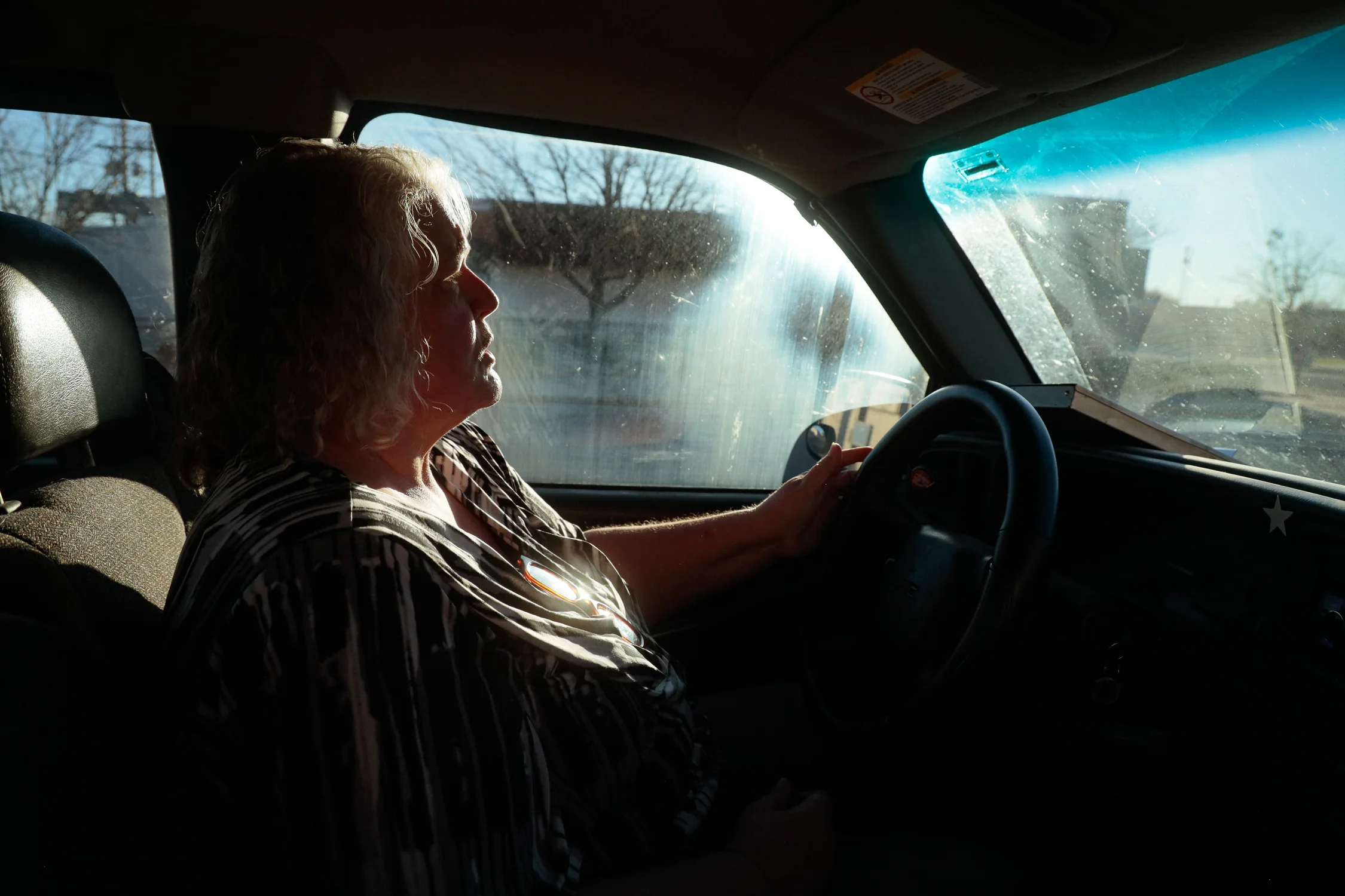 Catherine Thurston hand delivers the final edition of “The Leader” to Hoffman Drug in Limon. Photo: Cormac McCrimmon, Rocky Mountain PBS